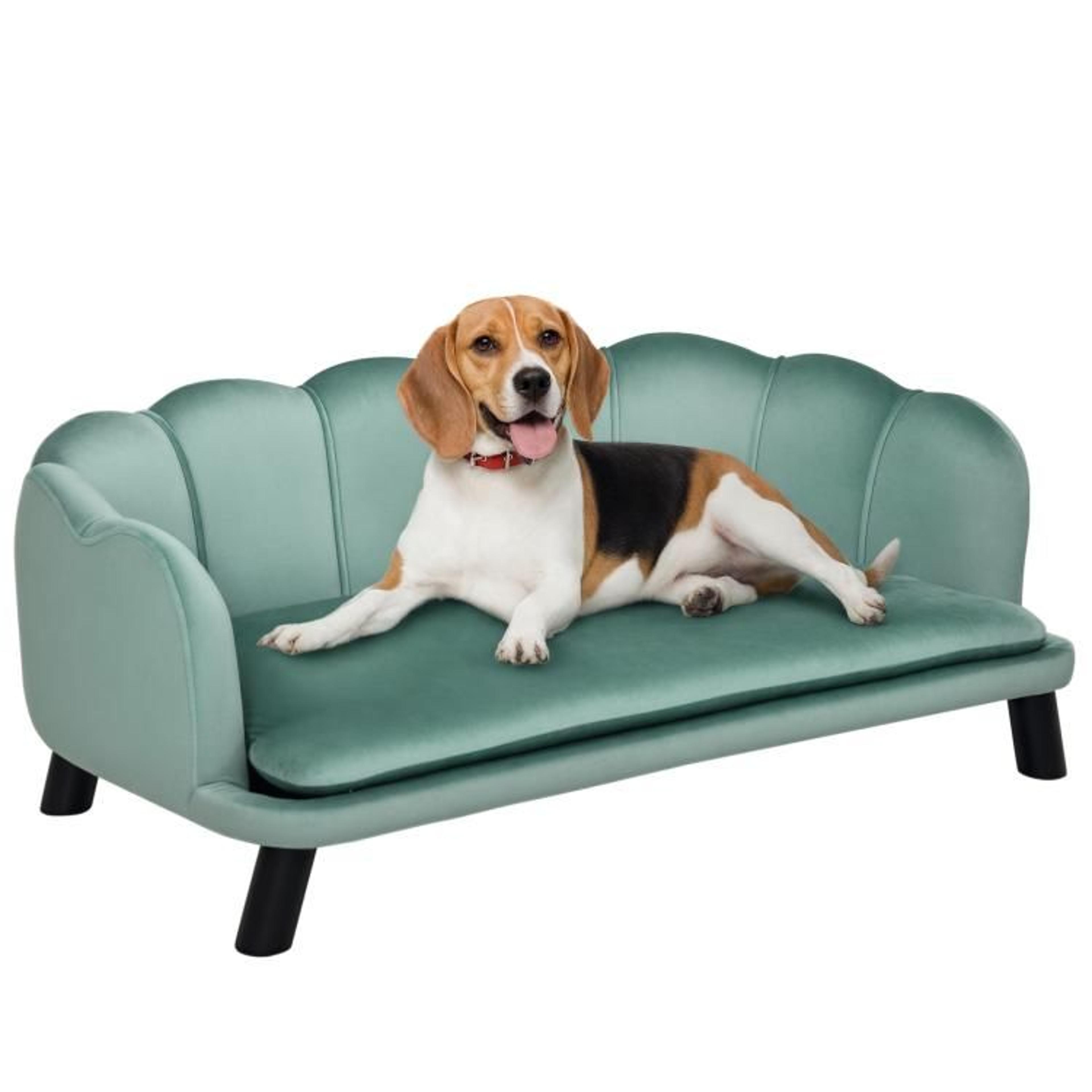 green pearl-shaped dog sofa bed with velvet upholstery and wooden legs