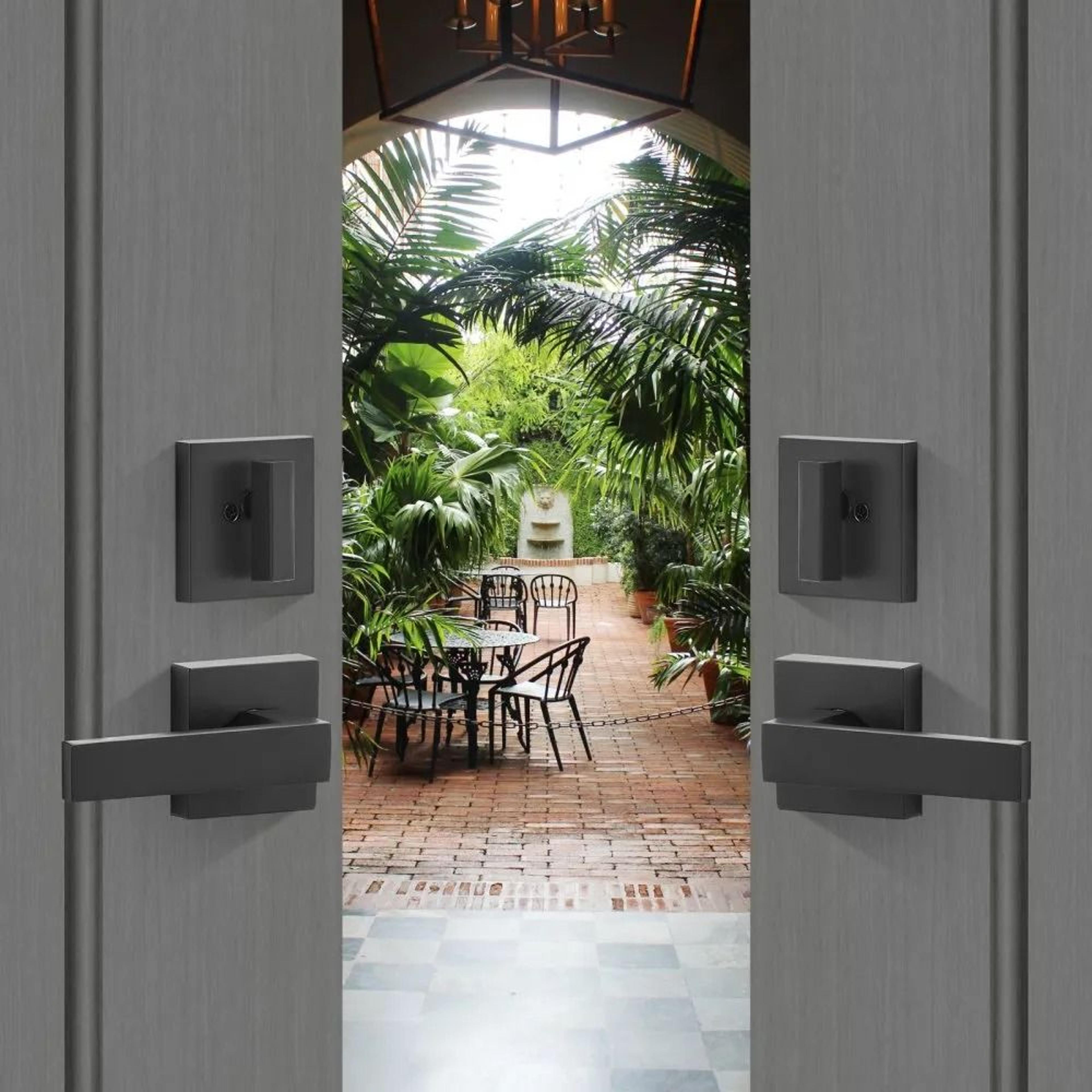 Double Door Handle Set With Matte Black Arched Levers And Reversible Locking Design 6