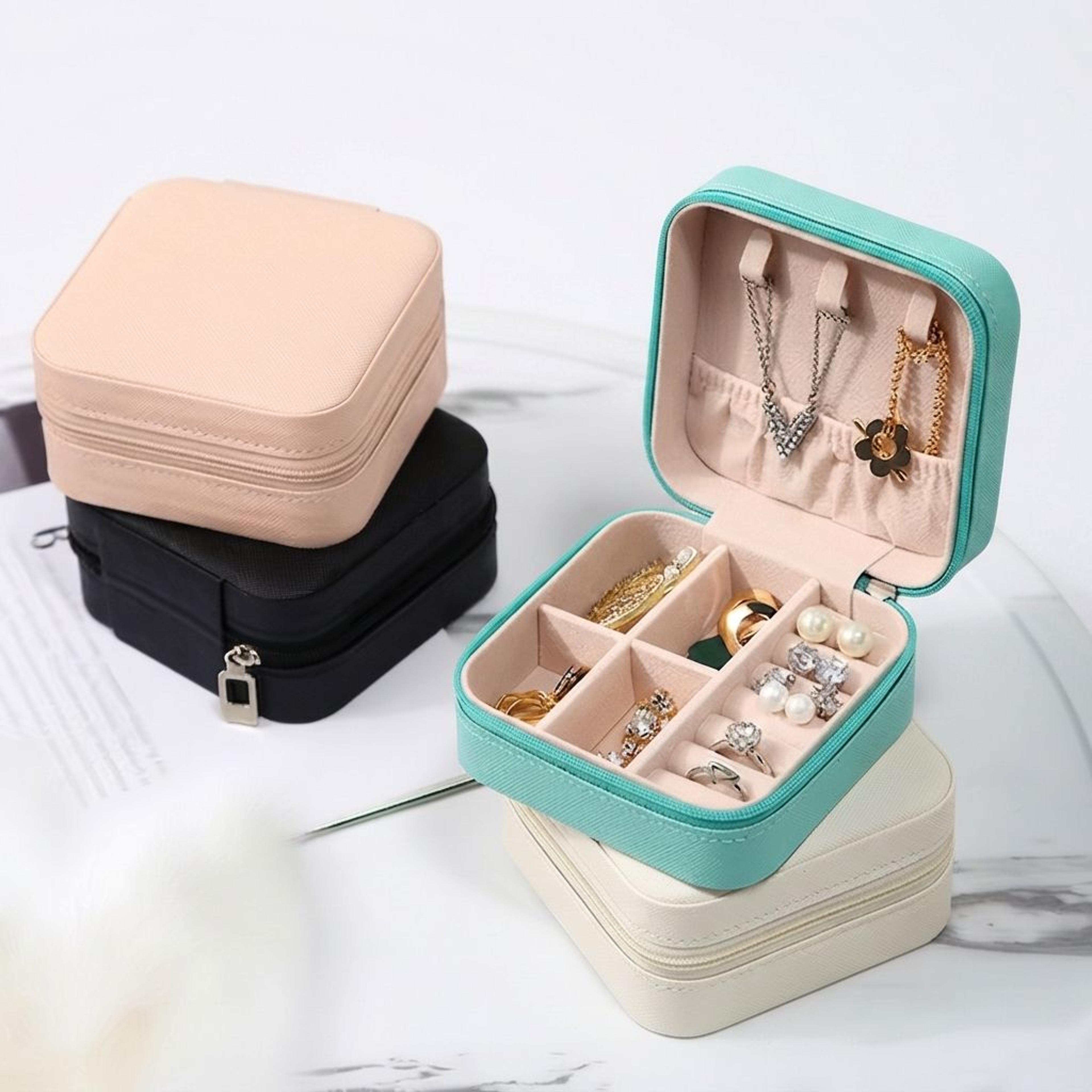 compact travel jewelry case with earring and ring organizers
