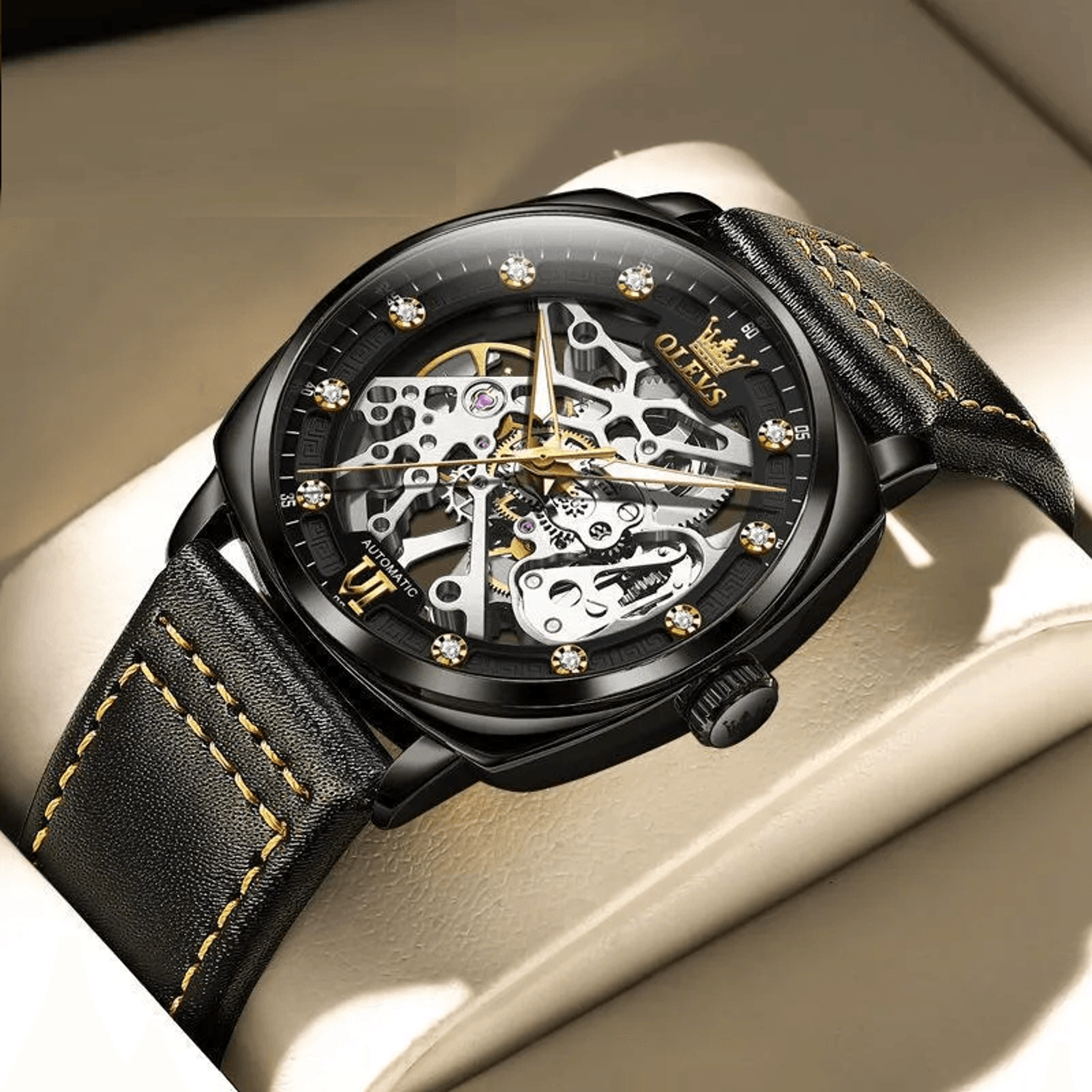 mens automatic mechanical watch with hollow dial and gold stainless steel band