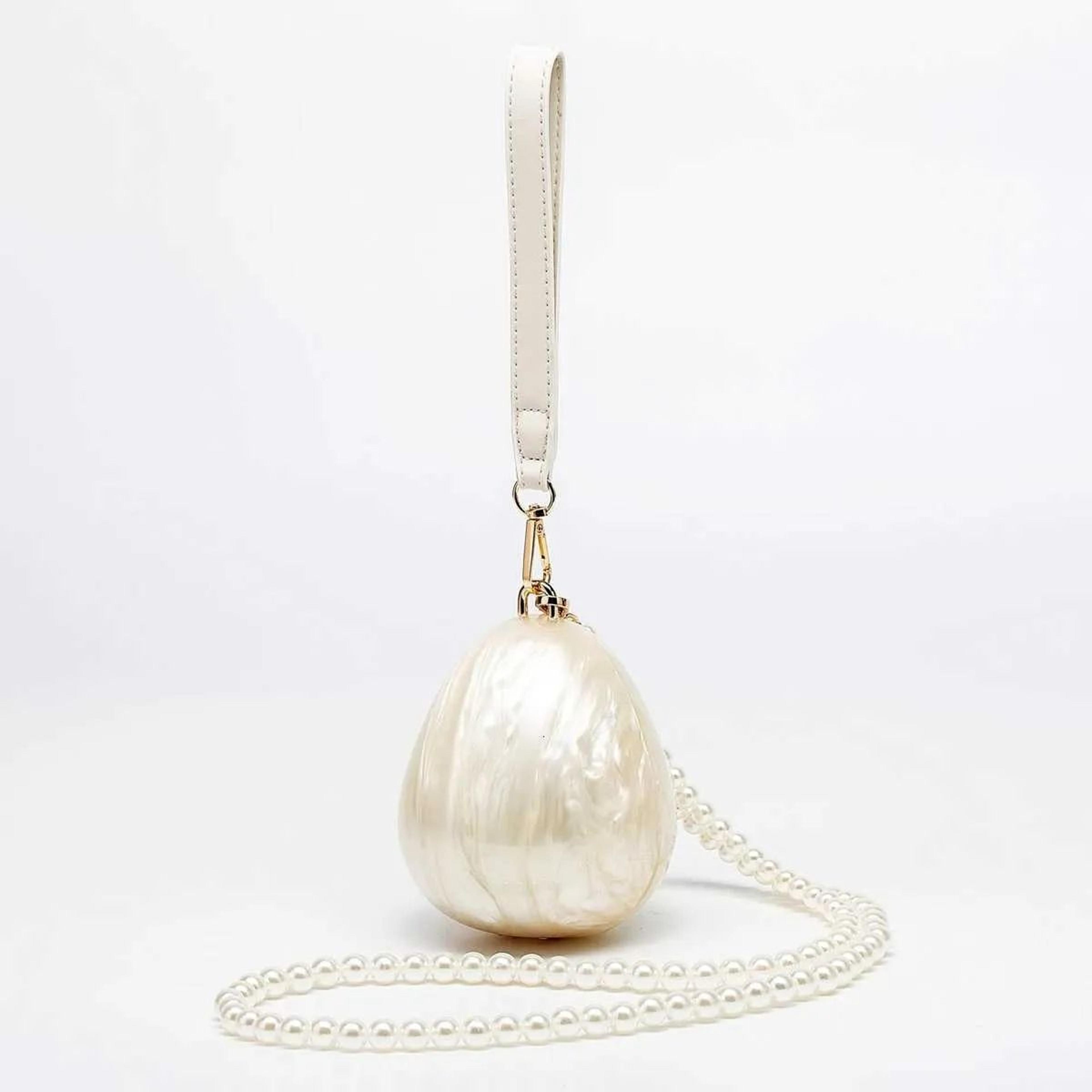 women's mini egg clutch bag with pearl accents for weddings and parties