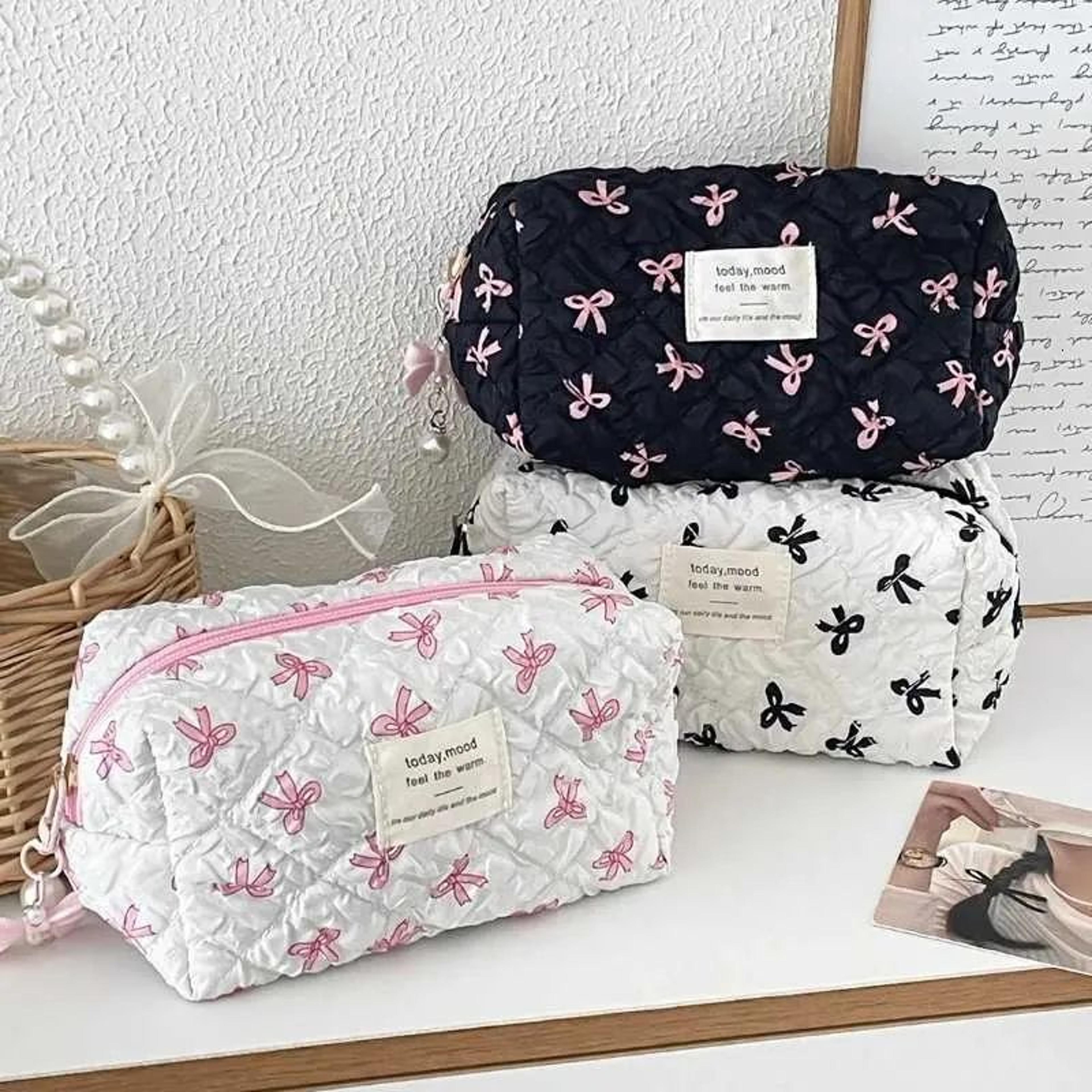 women's square makeup bag with bow print and zipper closure for travel