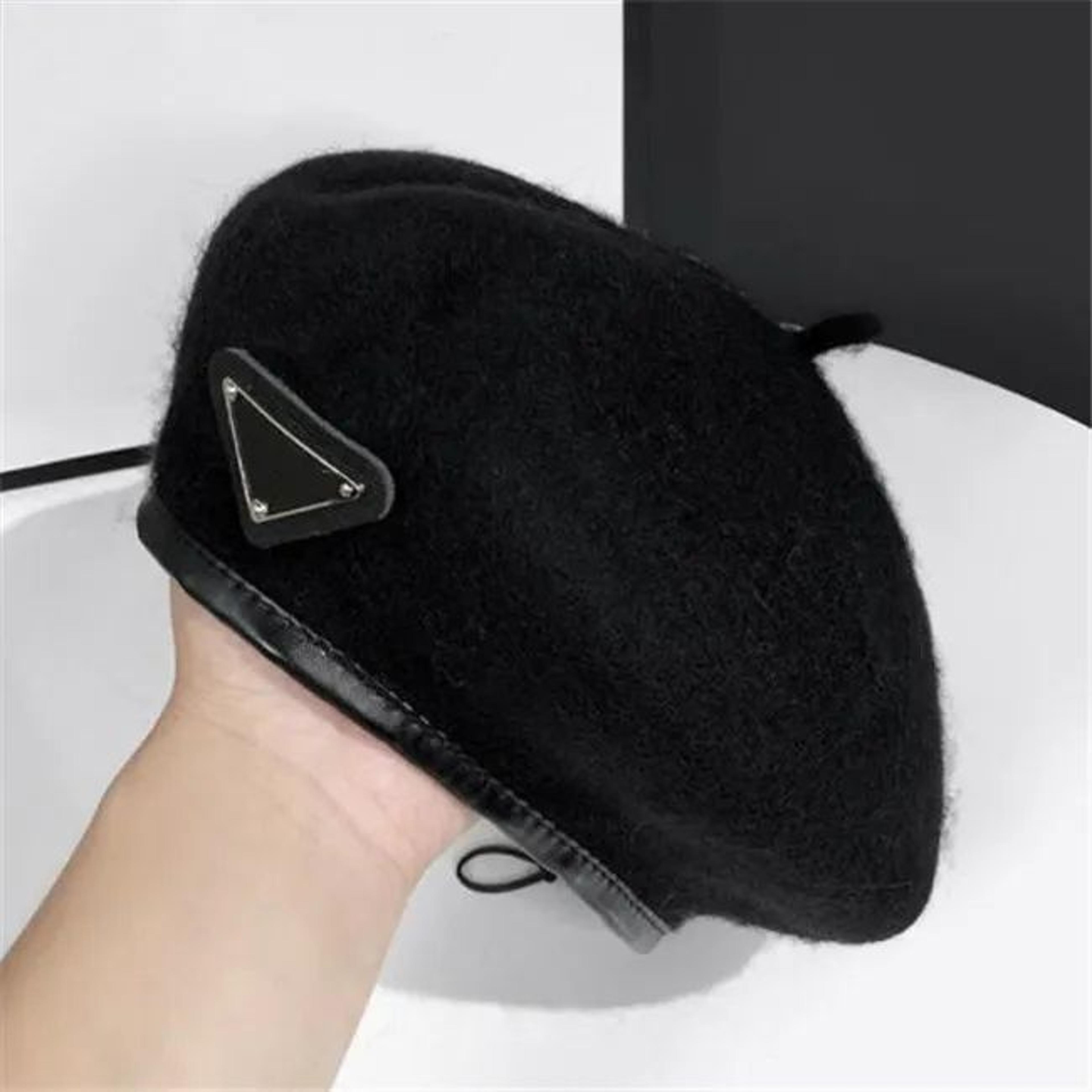 women's wool blend beret hat with adjustable fit and geometric patch