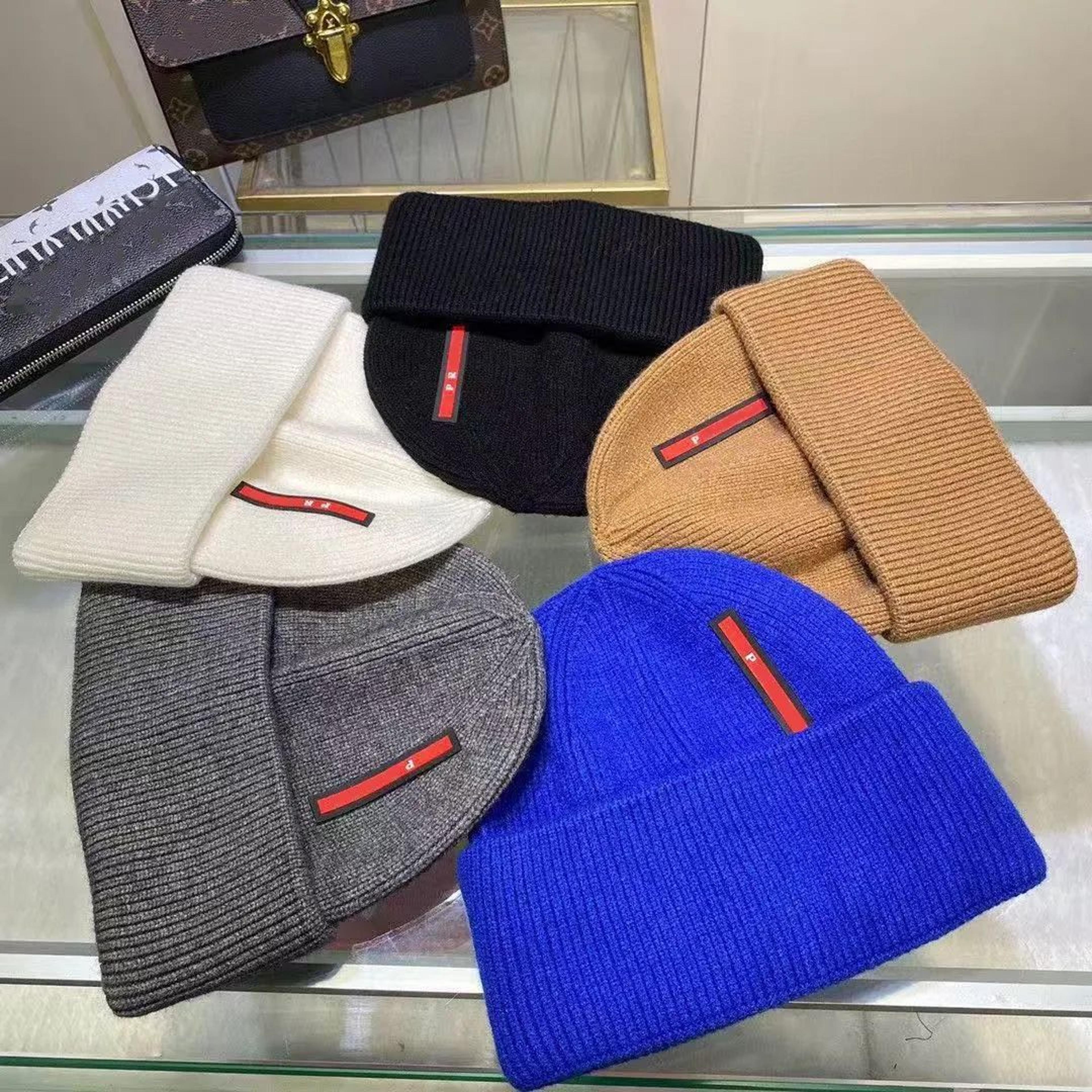 unisex knitted beanie hat with embroidered detail and gift box
