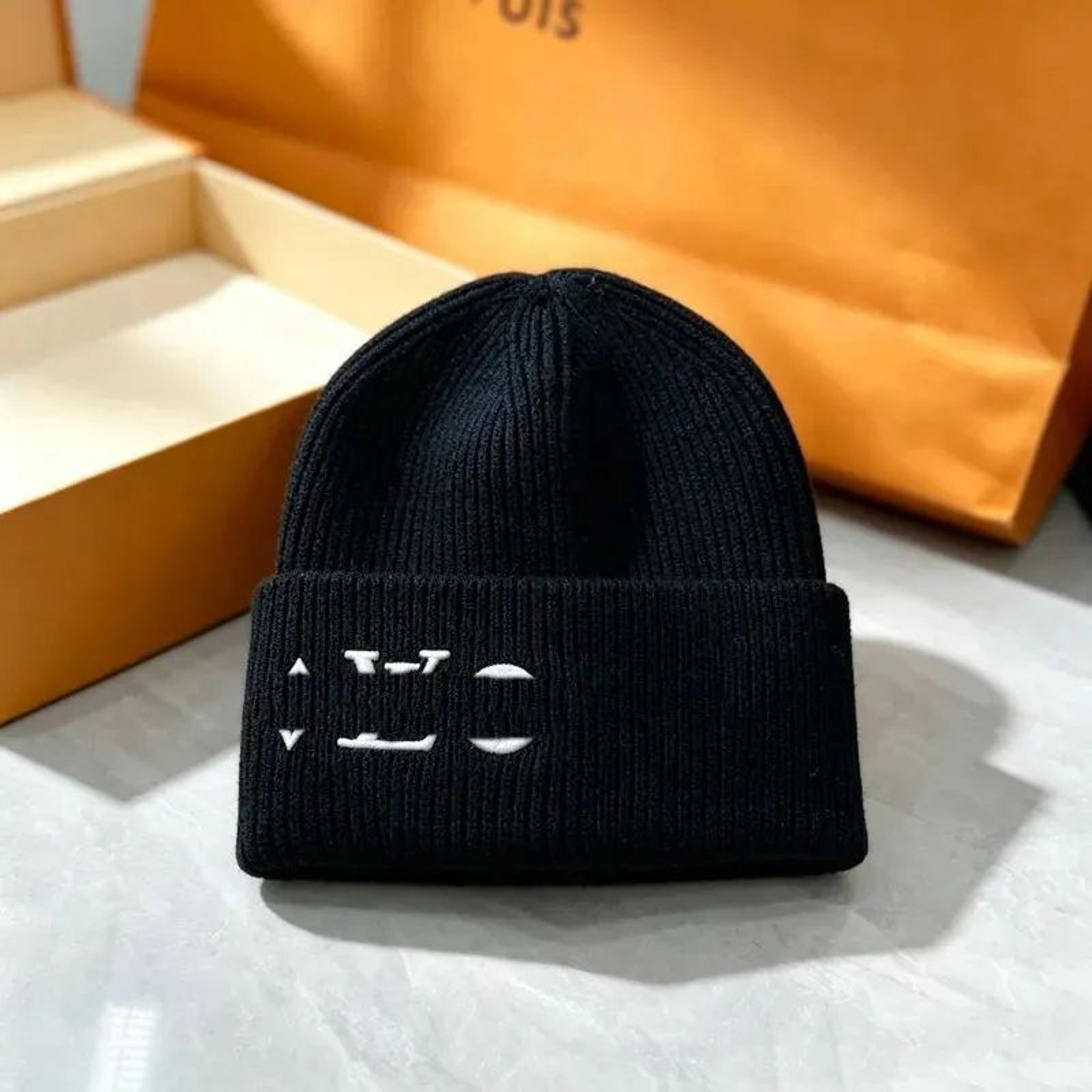 unisex winter knit beanie hat with embroidered skull graphic and plaid design