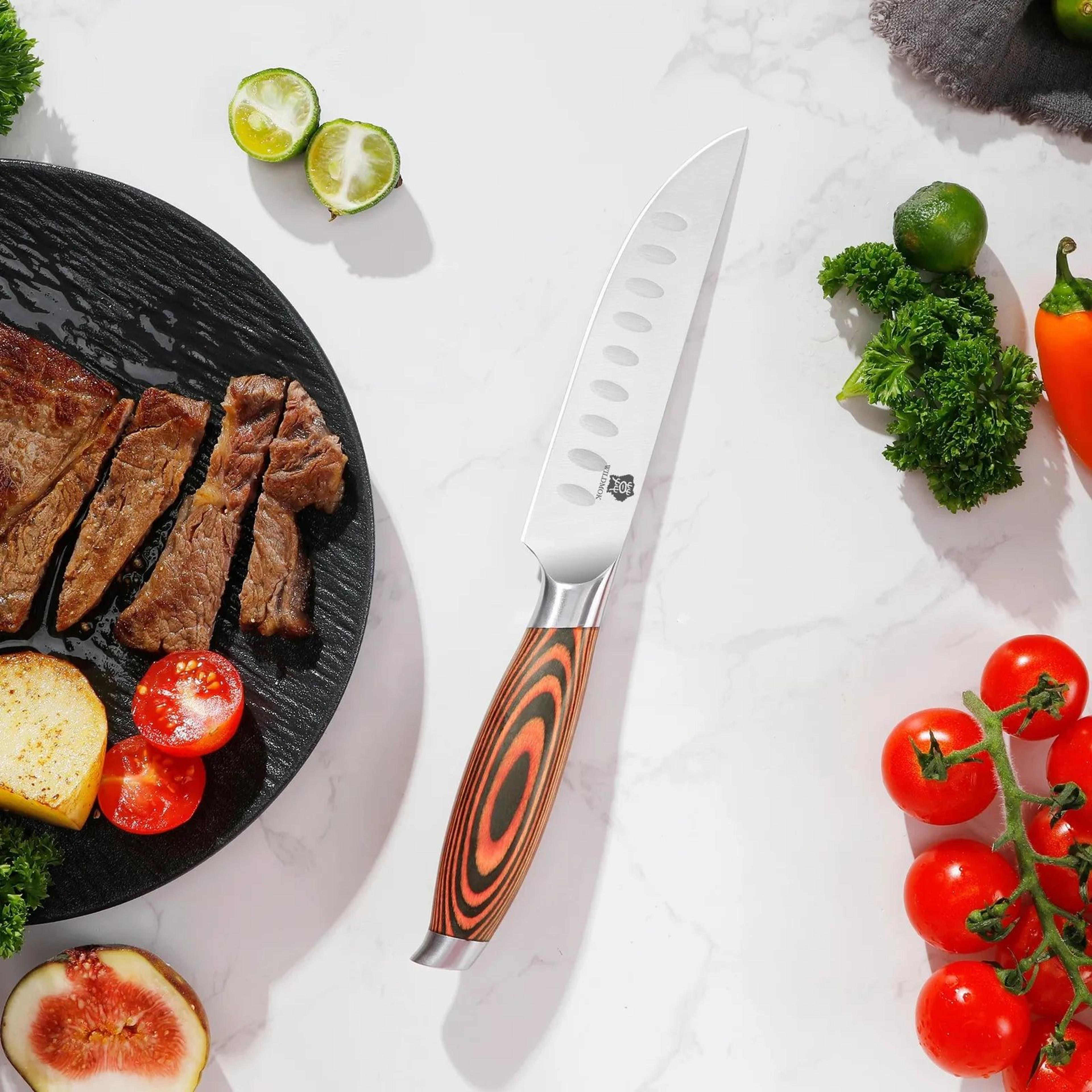 steak knife with stainless steel blade and orange pakkawood handle