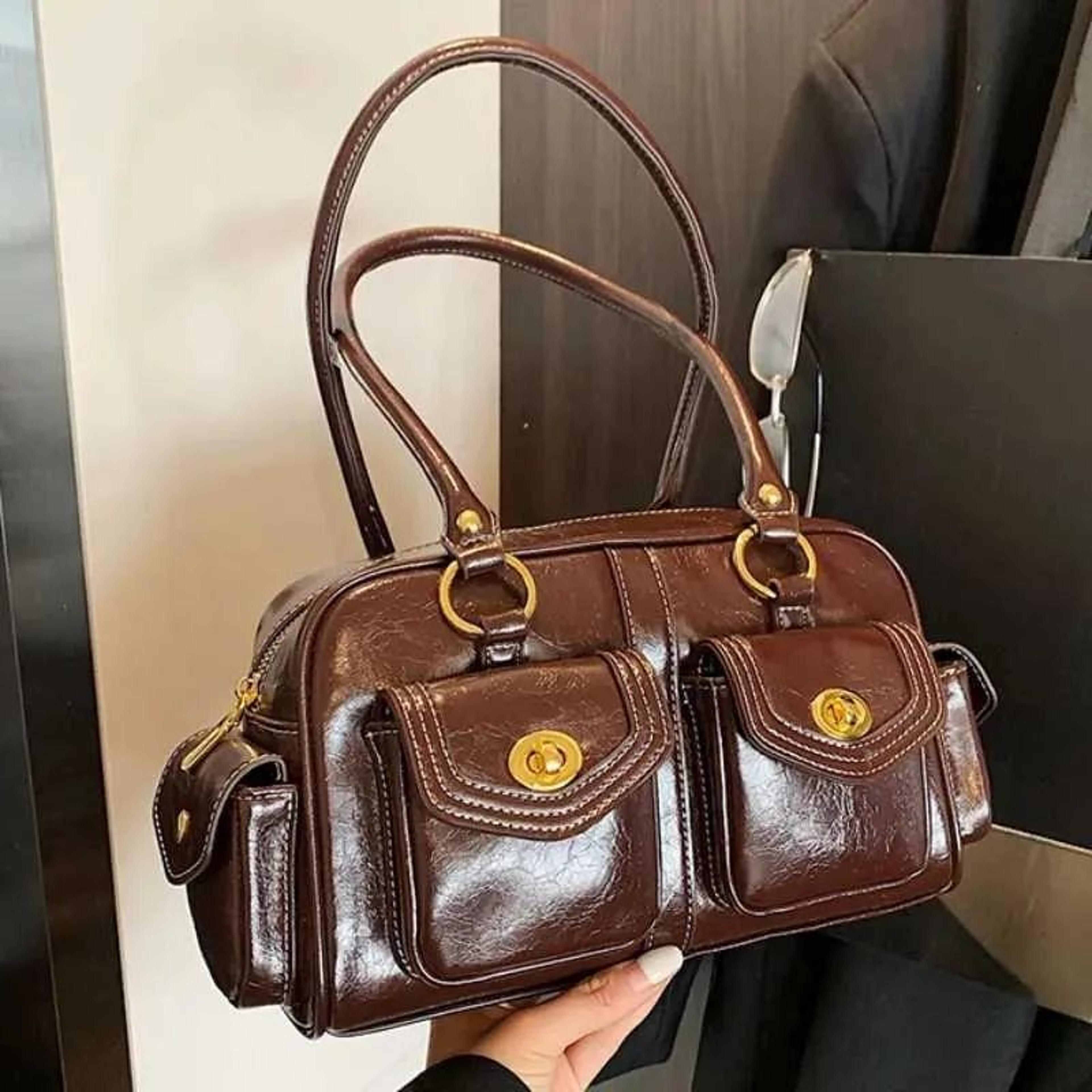vintage motorcycle shoulder bag with multiple zipper pockets and style