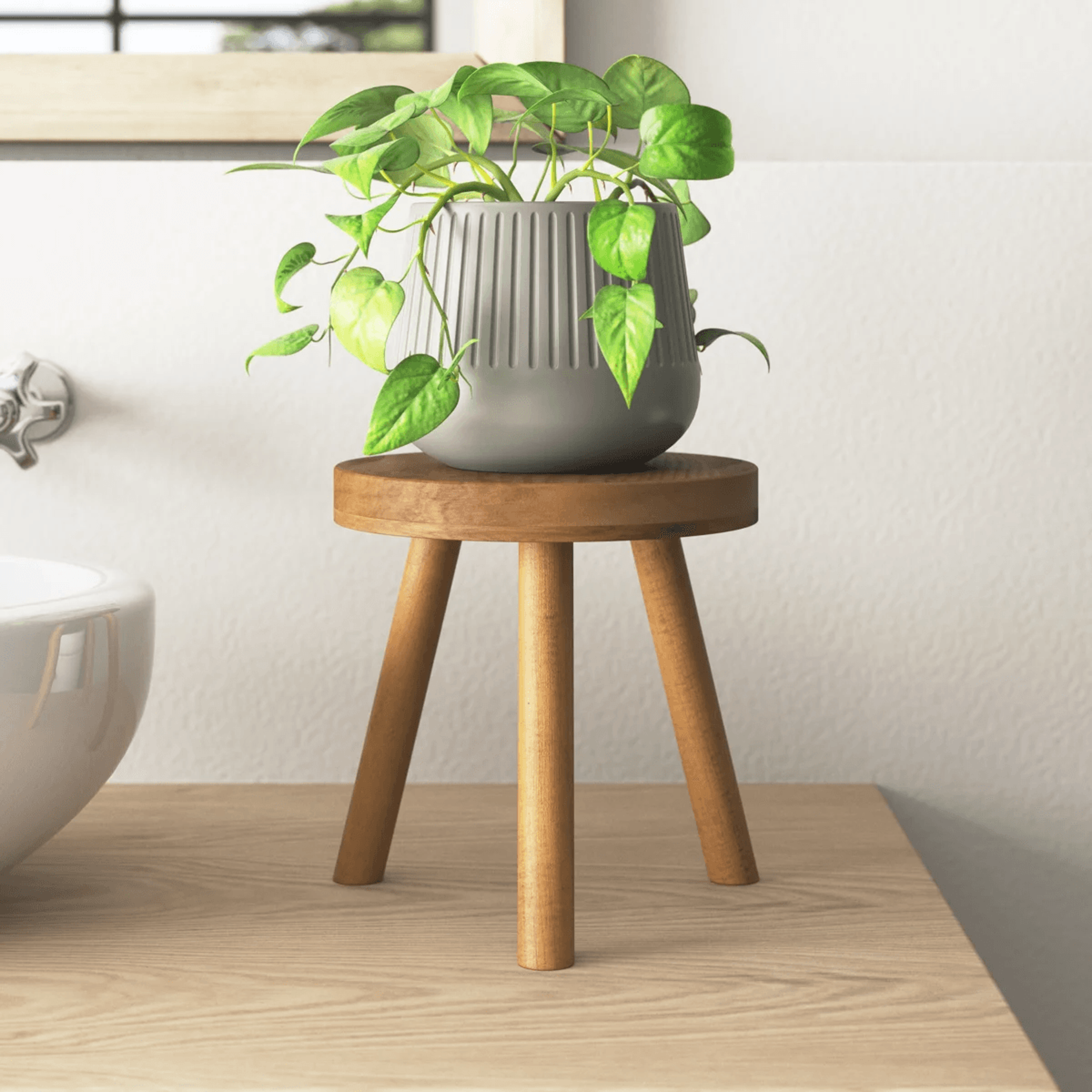 round solid wood plant stand with tripod legs single tier
