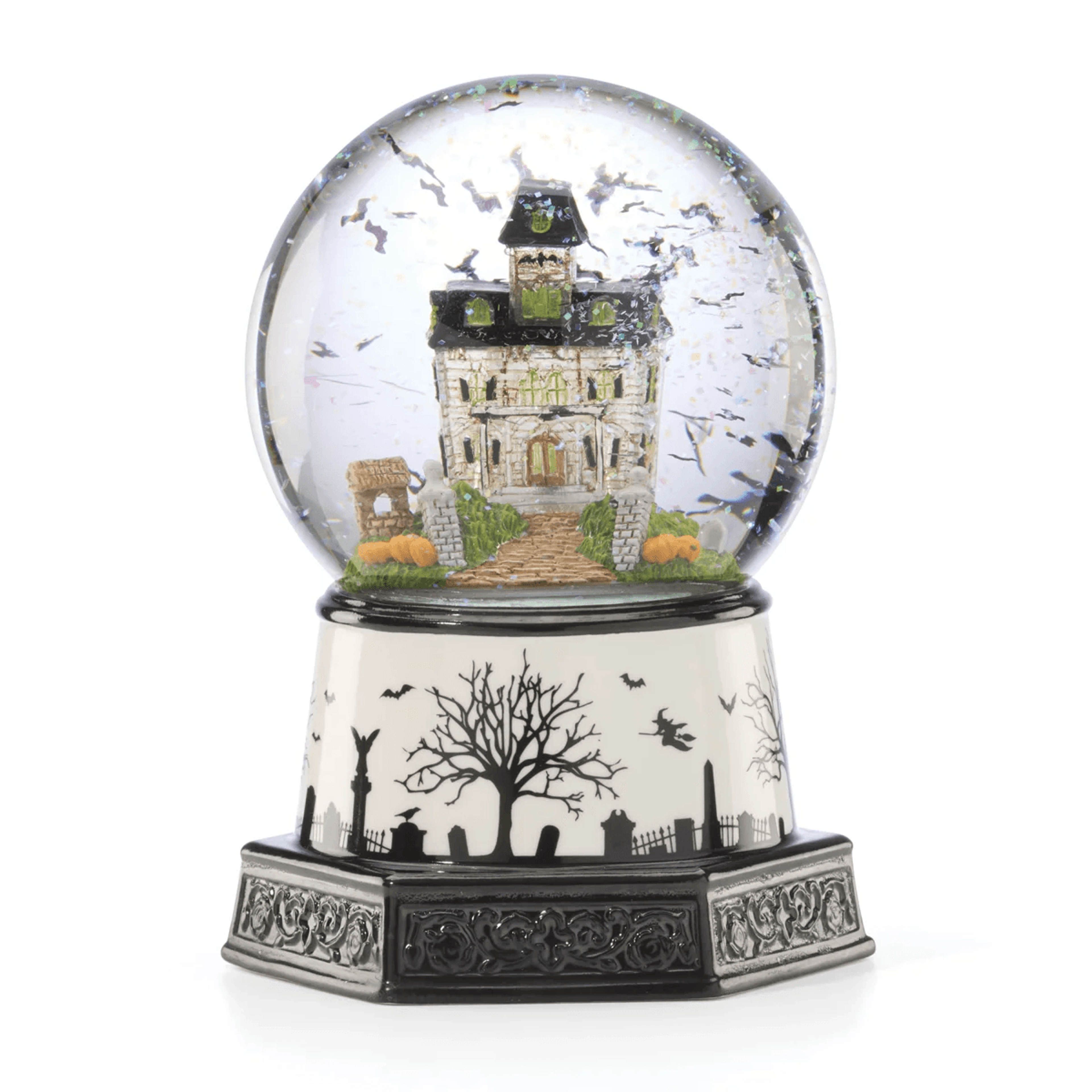 halloween light up snow globe with haunted village scene and glass globe
