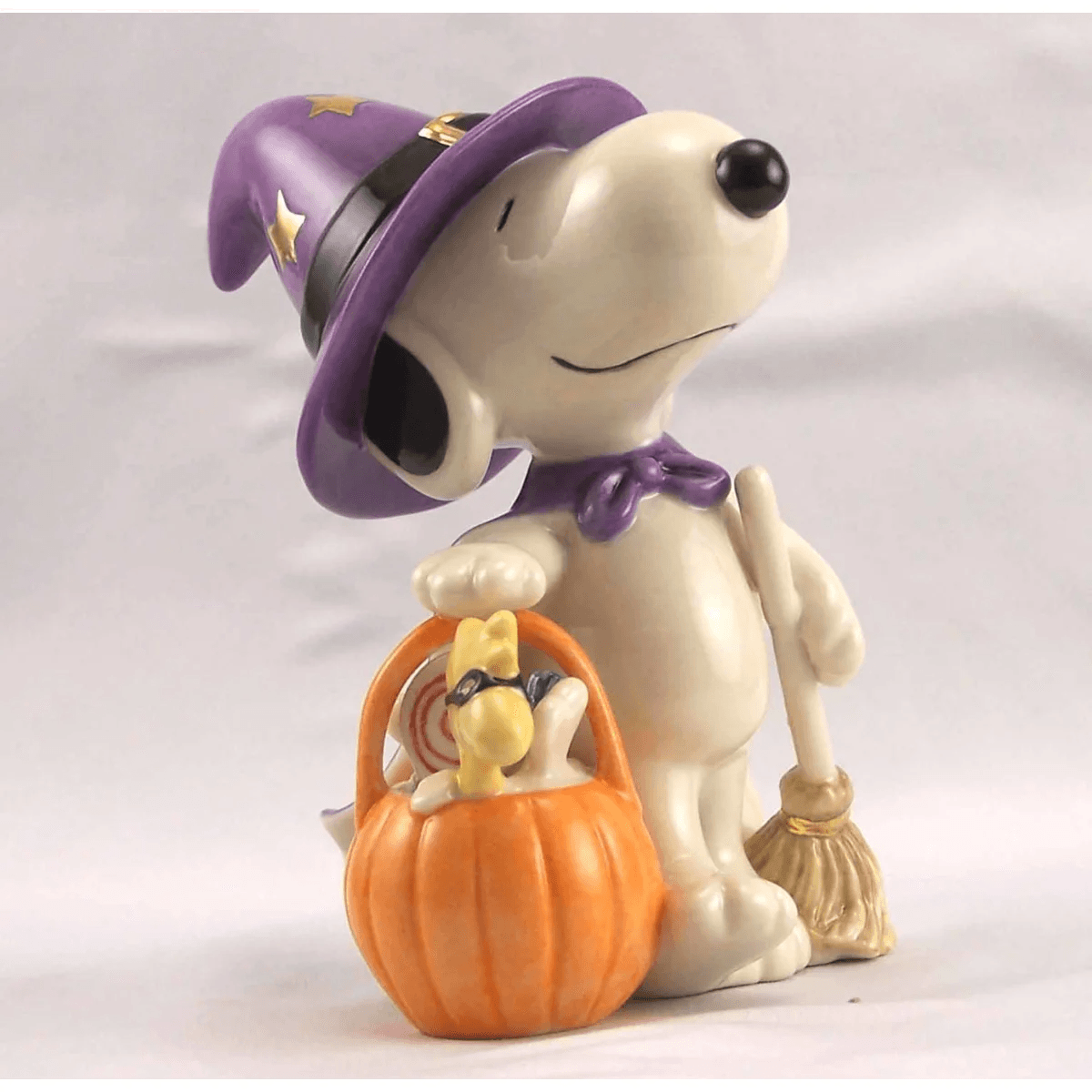 snoopy and woodstock halloween figurine with gold accents