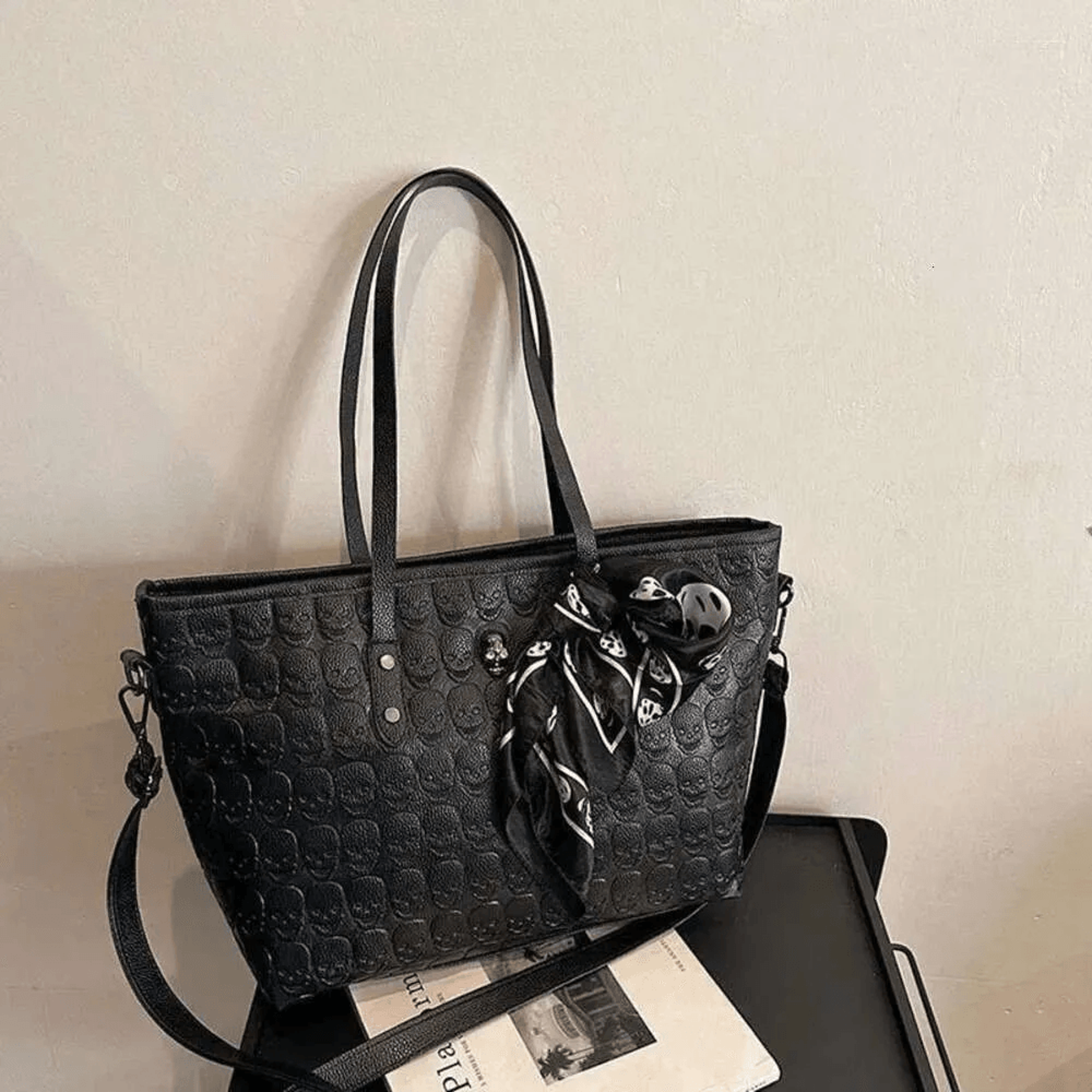 large skull print shoulder bag with rivet accents and silk scarf