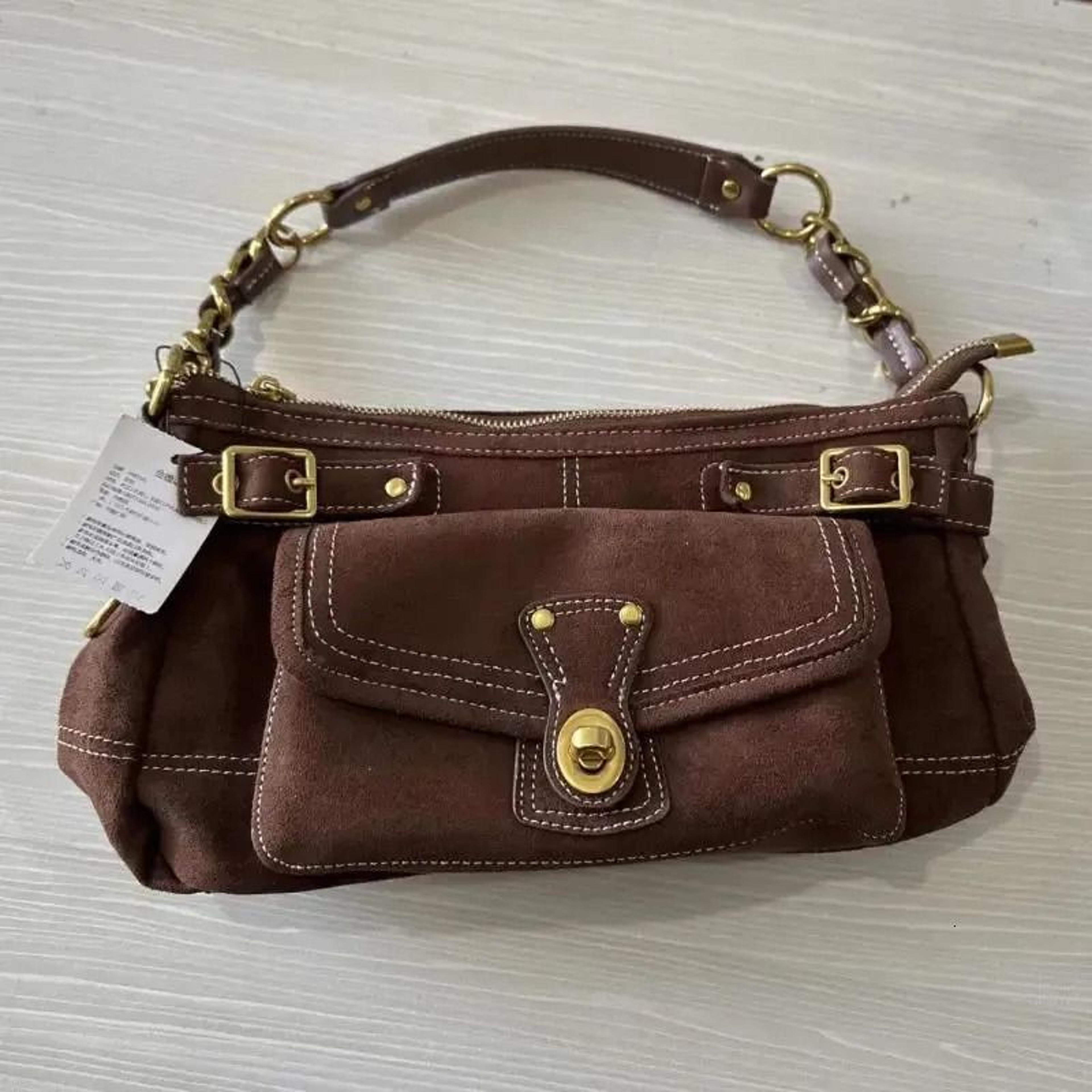retro suede shoulder bag with multi-pocket design and zipper closure