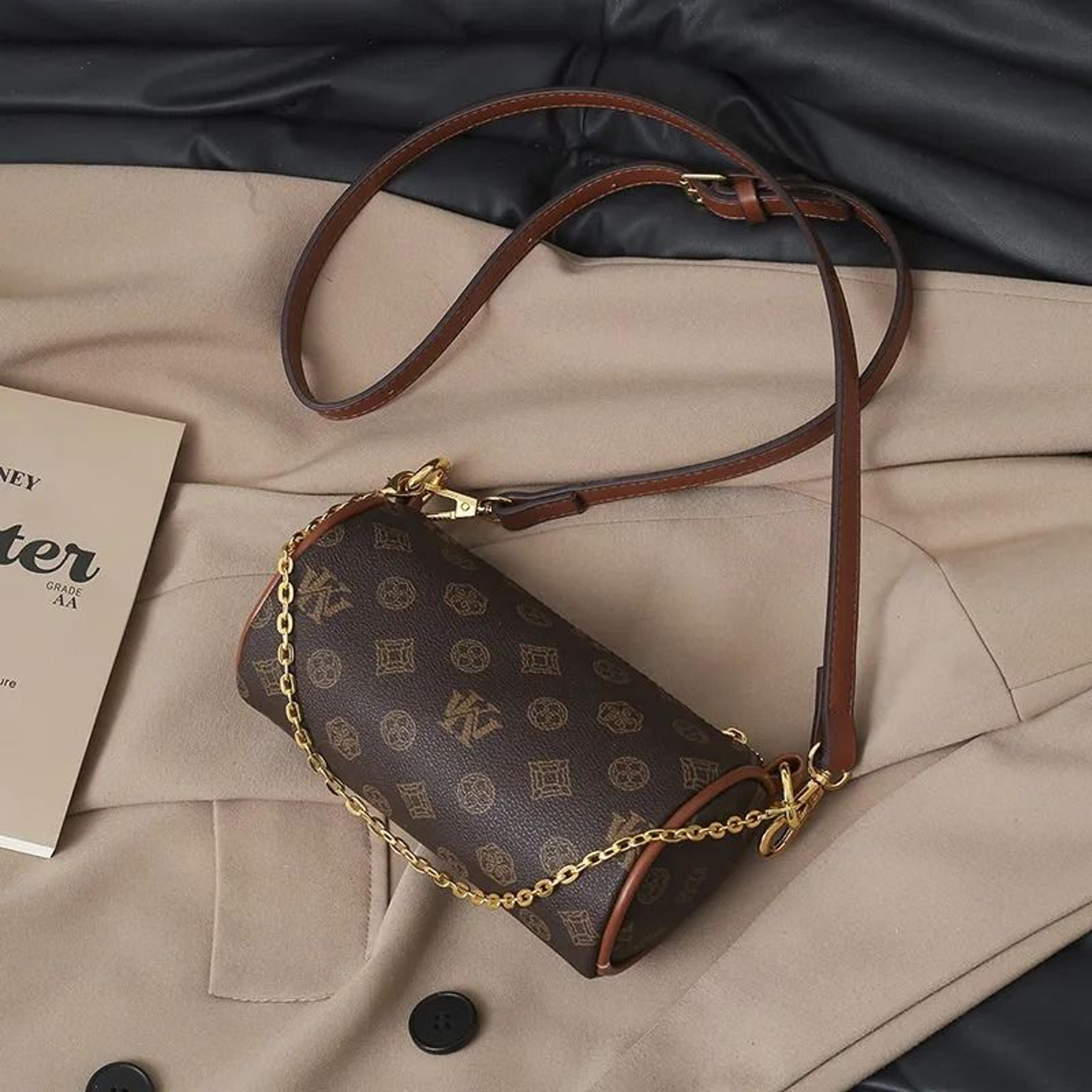 retro monogram cylinder crossbody bag with chain strap