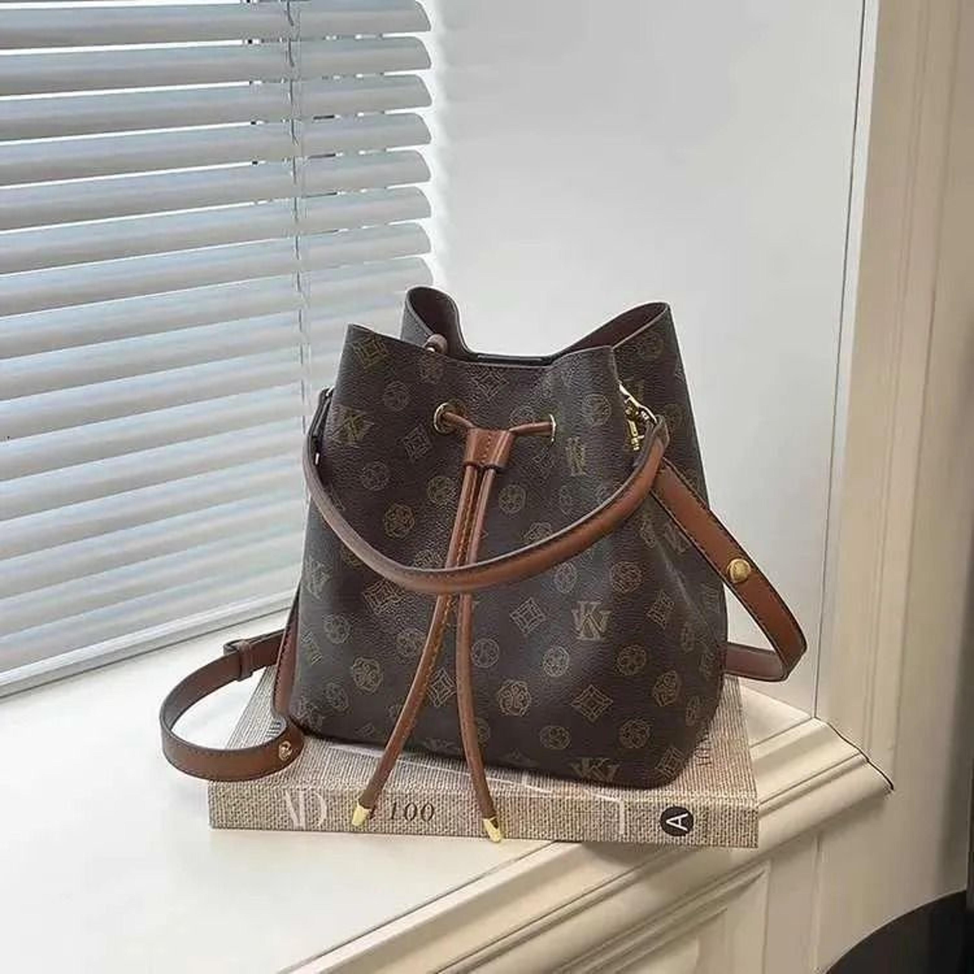 women genuine leather crossbody bag with adjustable strap and magnetic snap closure