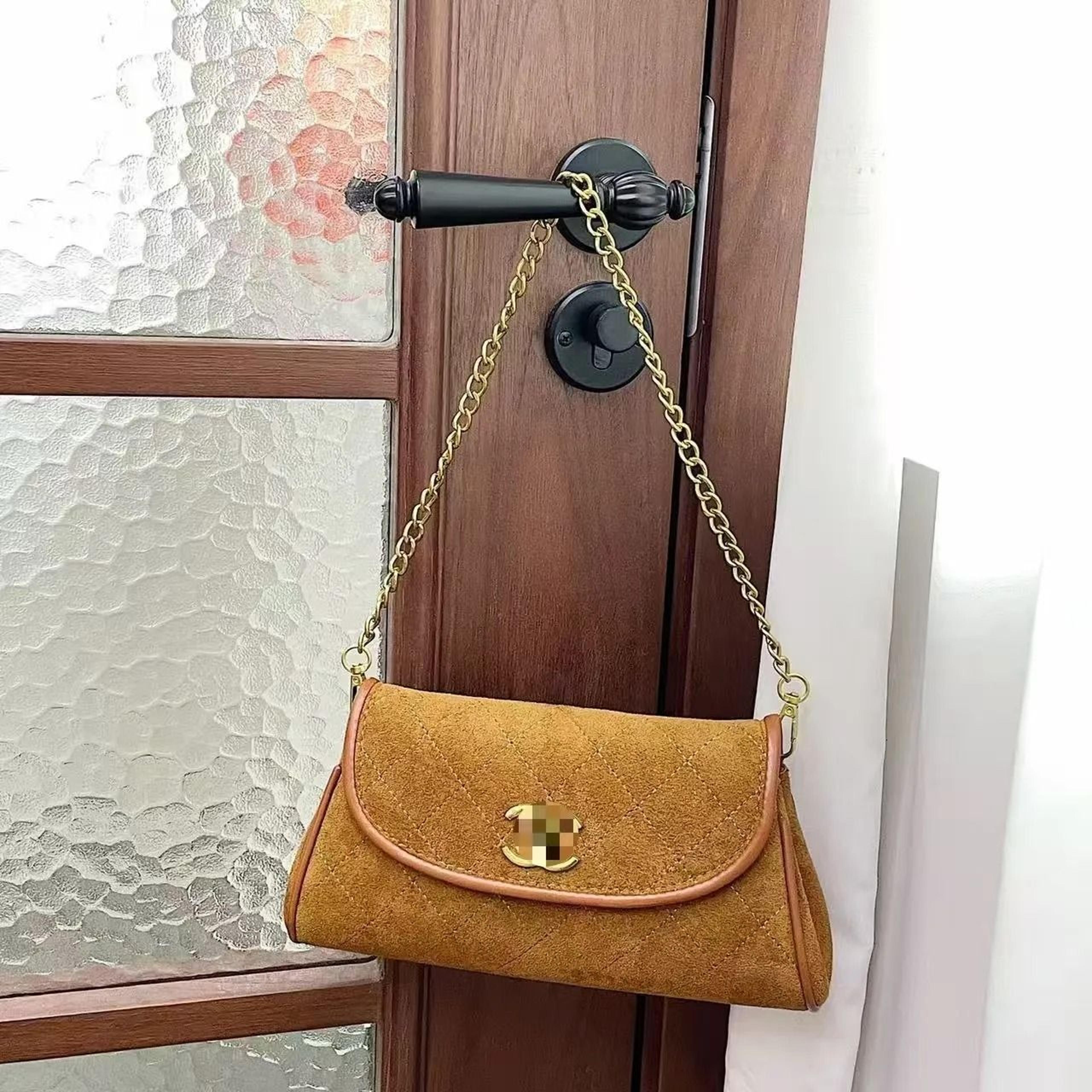 embroidered shoulder bag with flip cover wallet
