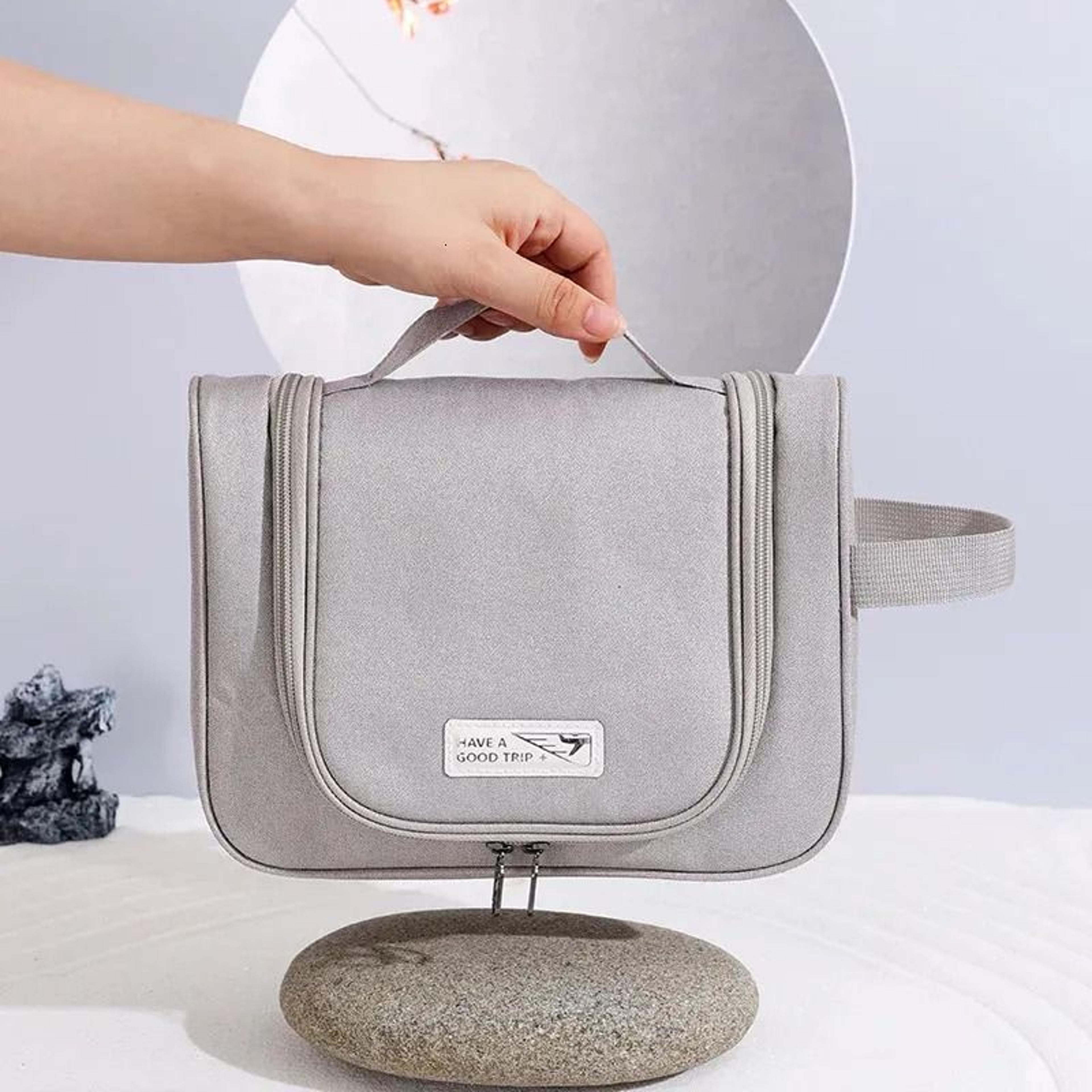 portable hanging toiletry bag with water-resistant nylon and zippered compartments