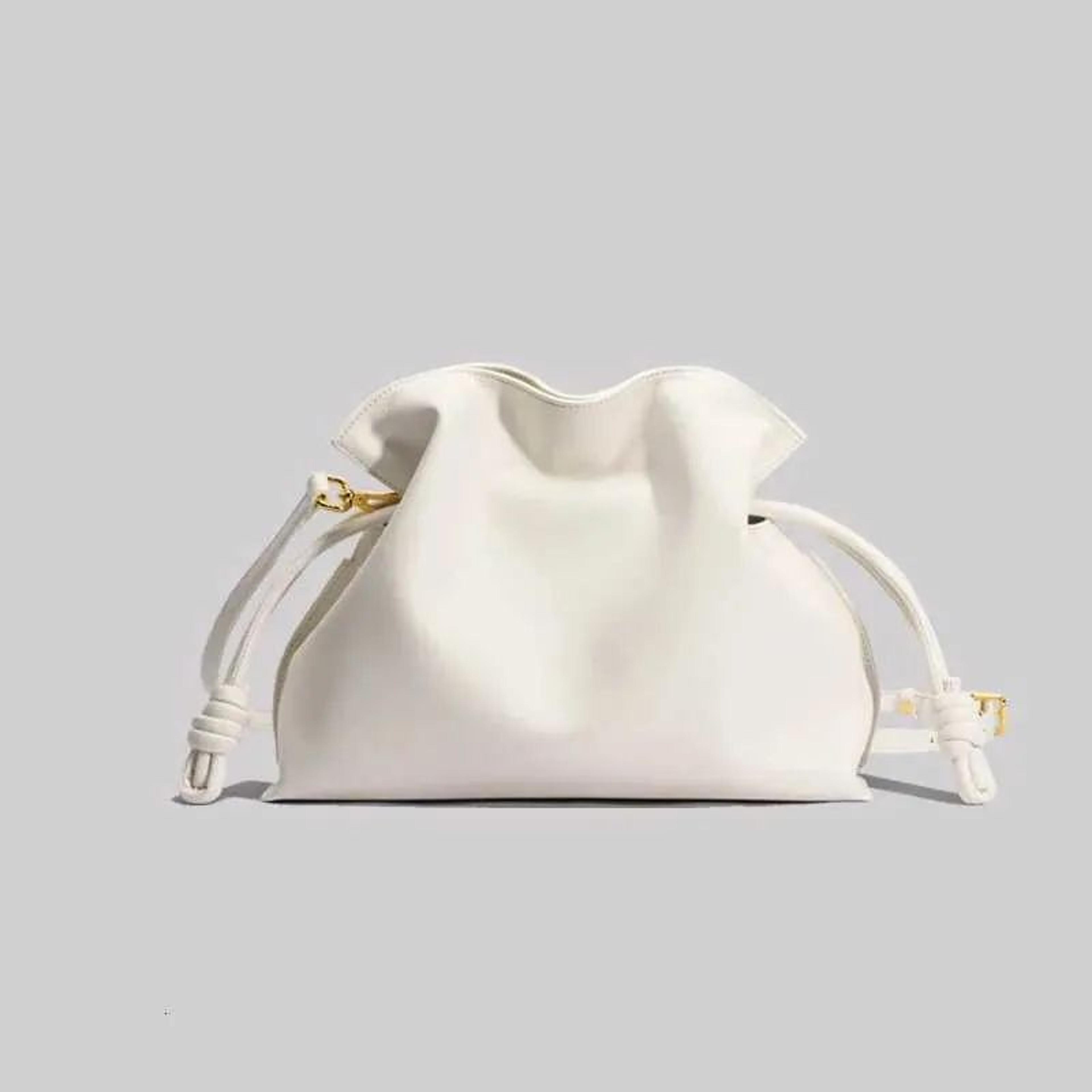 genuine cowhide leather shoulder bag with pleated drawstring bucket design