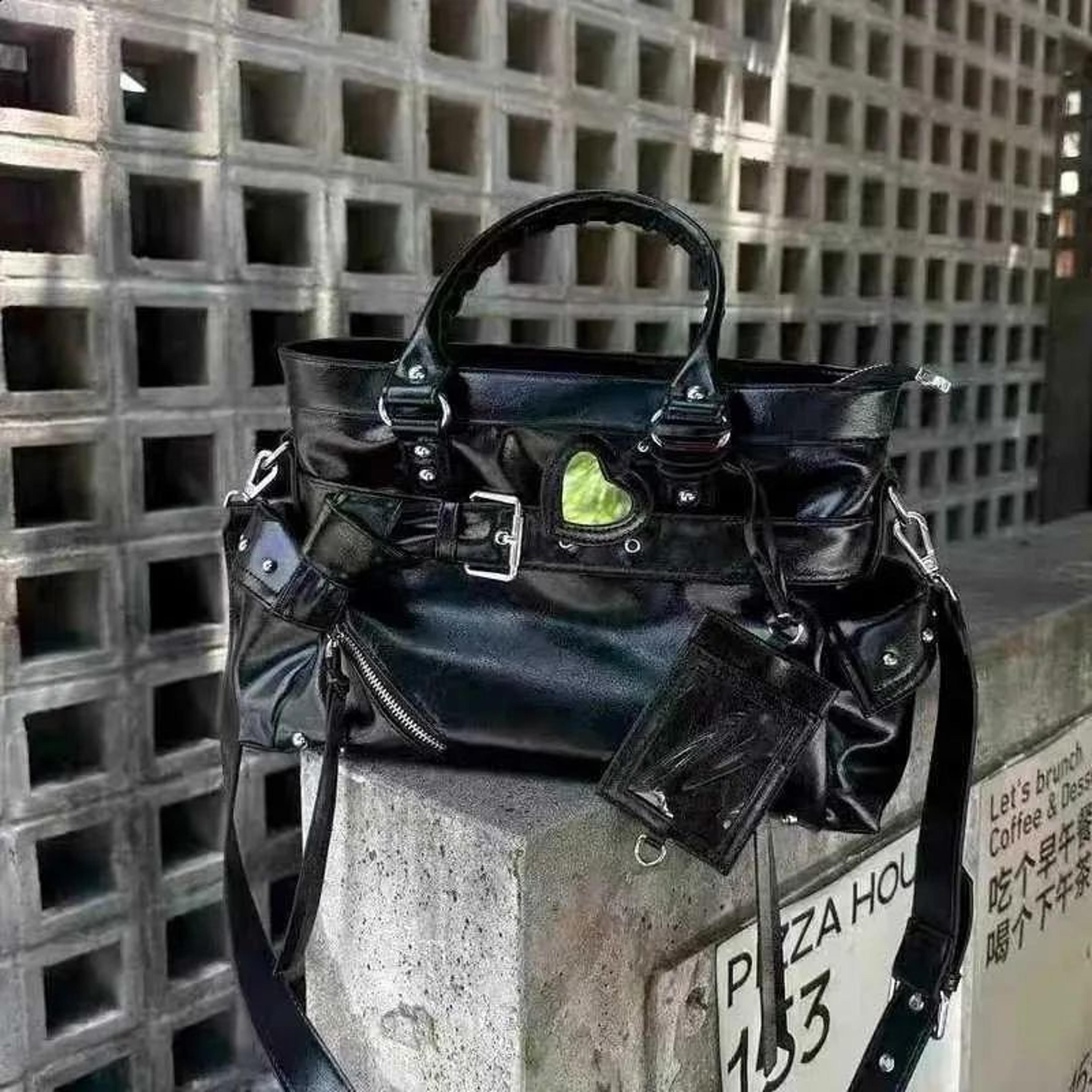 womens biker tote bag with rivet belt buckle and pu leather design
