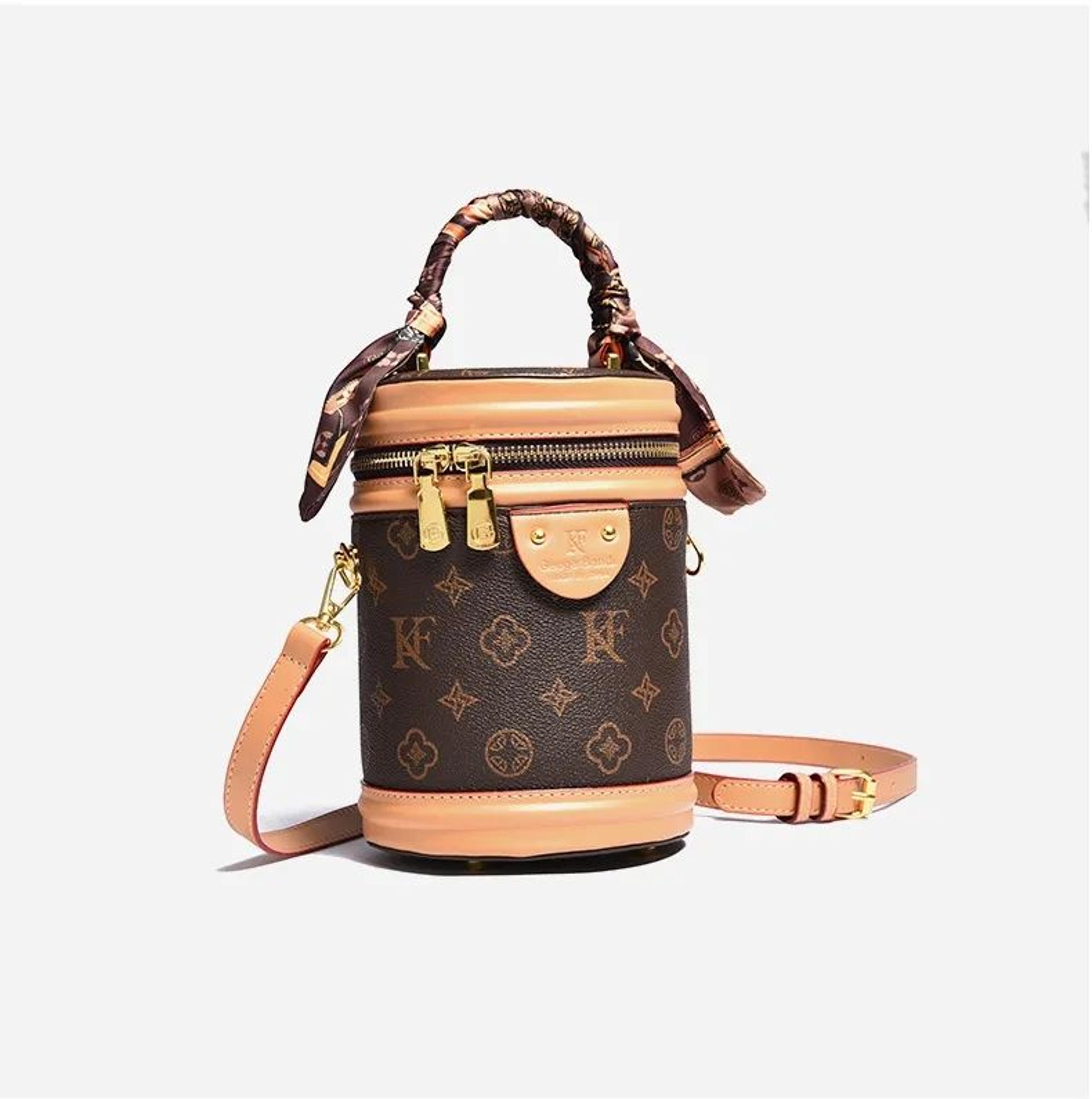 womens slim vertical handbag with minimalist top handle and shoulder bag design