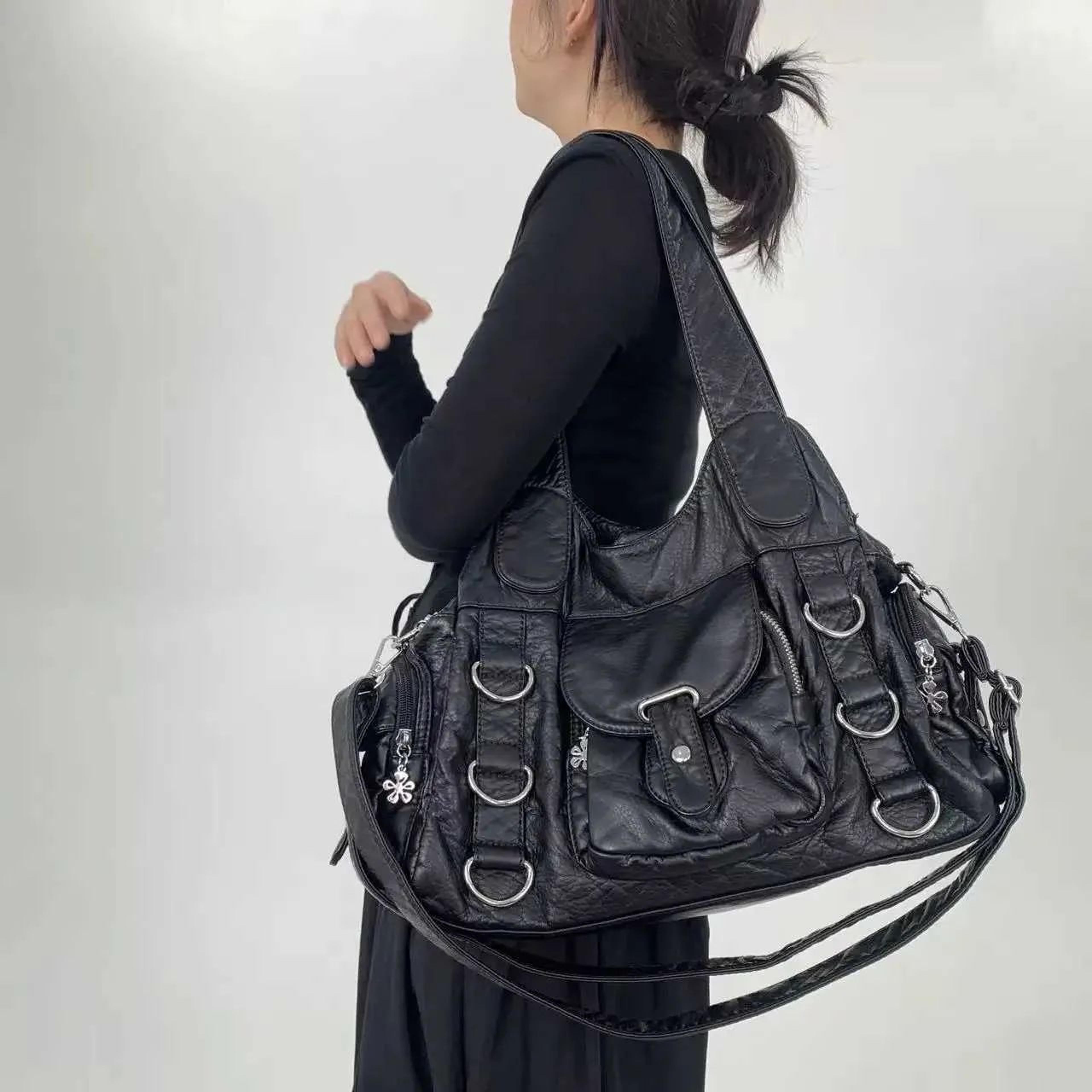 womens small pu dumpling handbag with top handle and multiple pockets