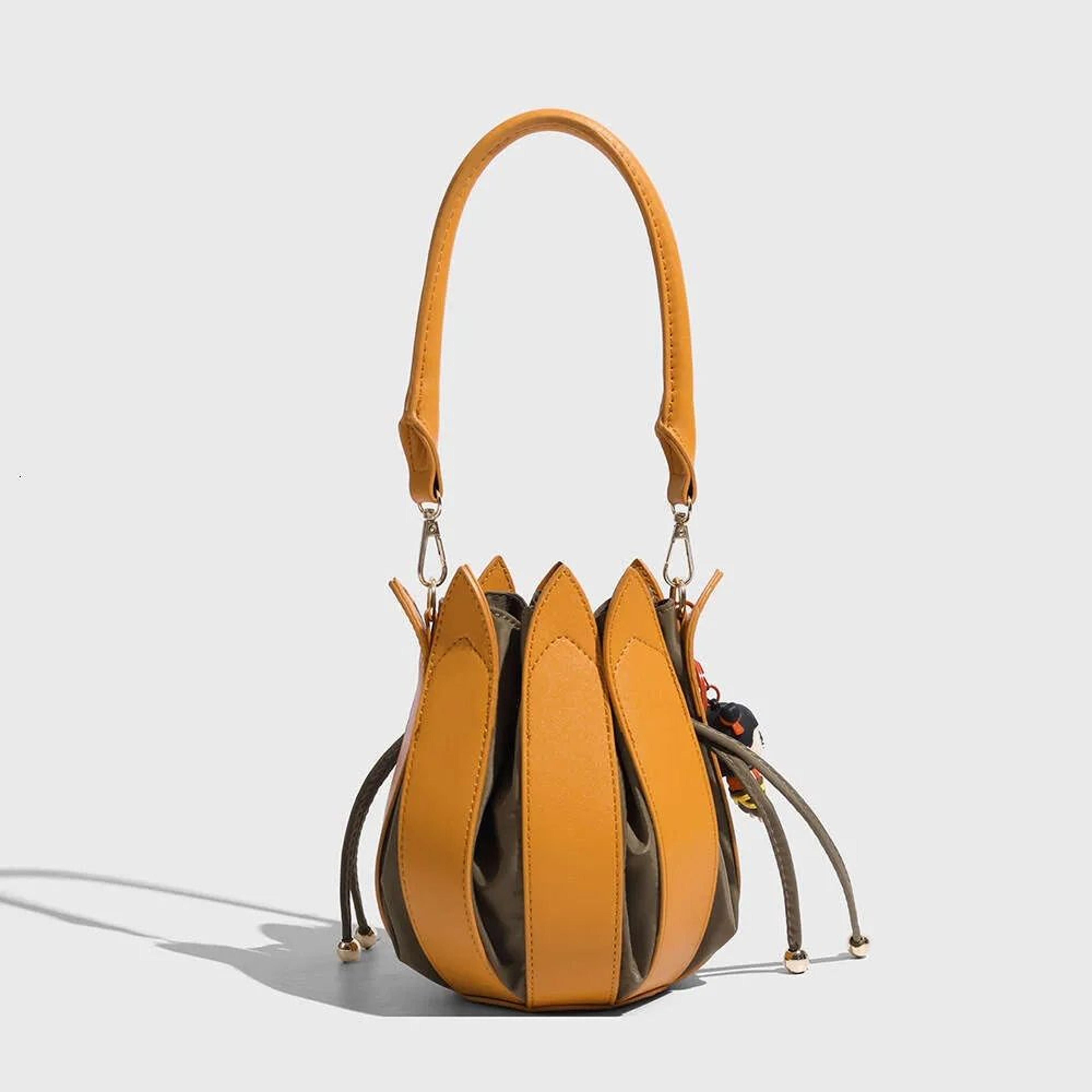women orange lotus flower crossbody bag with drawstring closure
