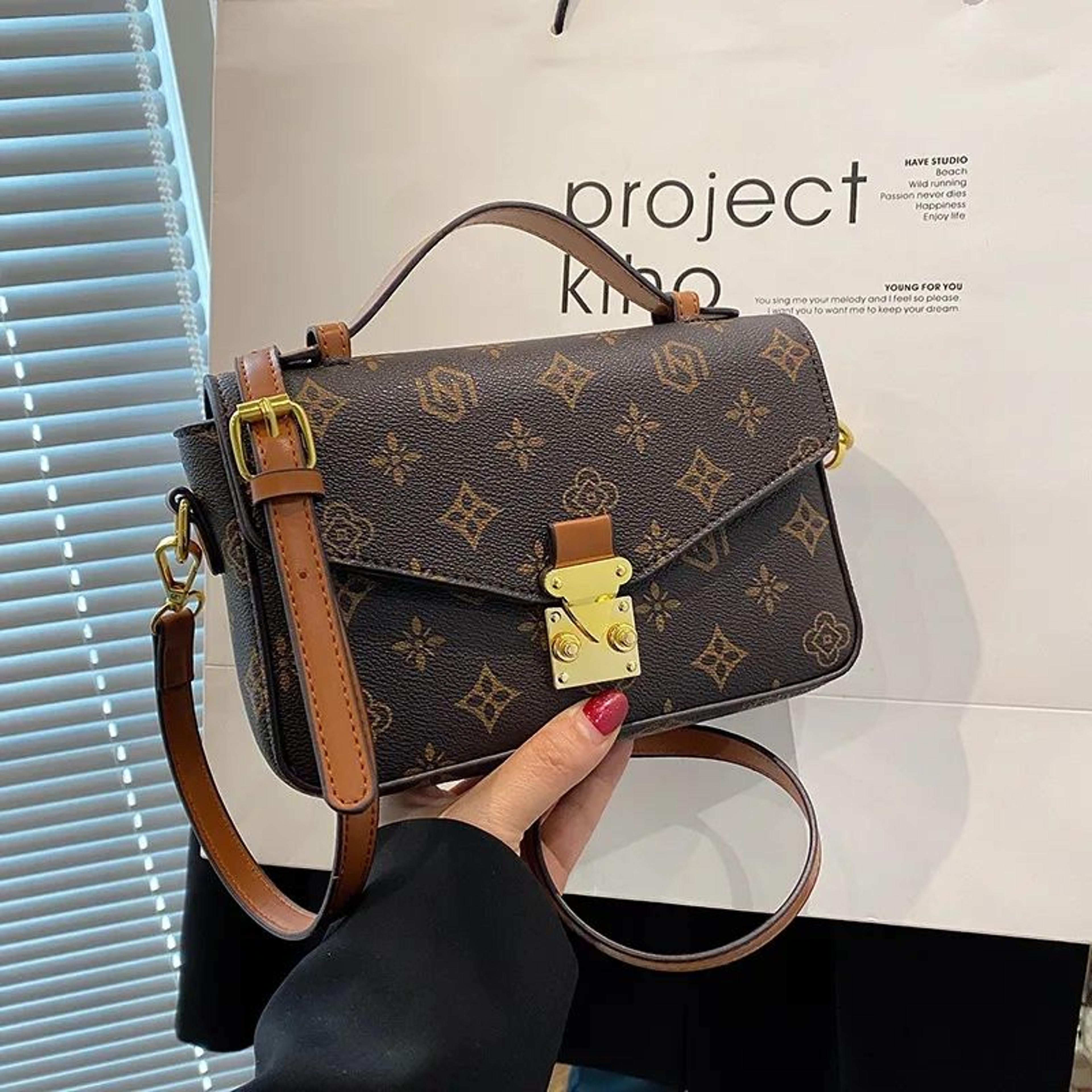 women square crossbody bag with artistic floral print and vegan leather