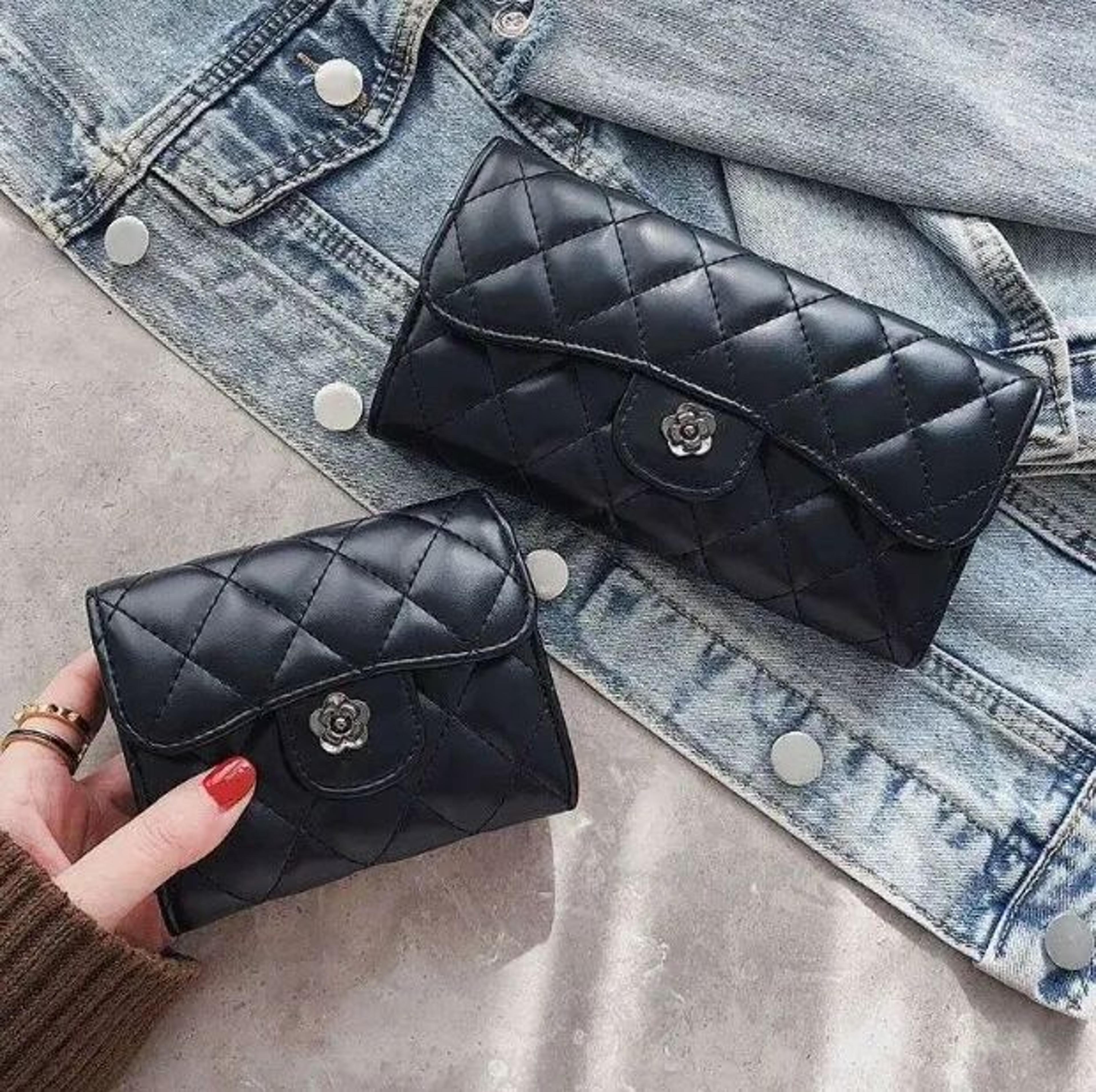 womens black diamond-embroidered camellia long wallet with zipper closure