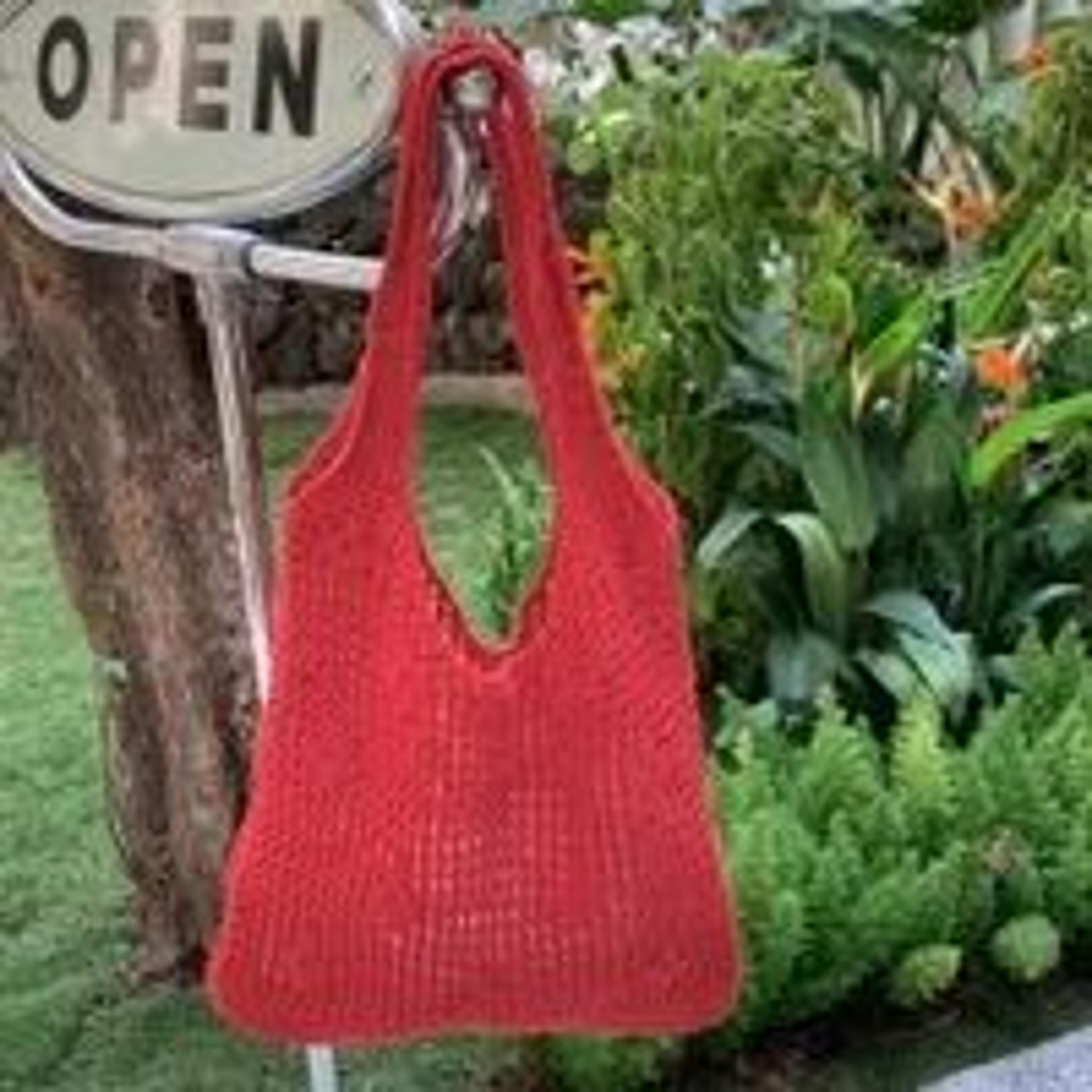 cotton knit shoulder bag with hollow out woven design for vacations