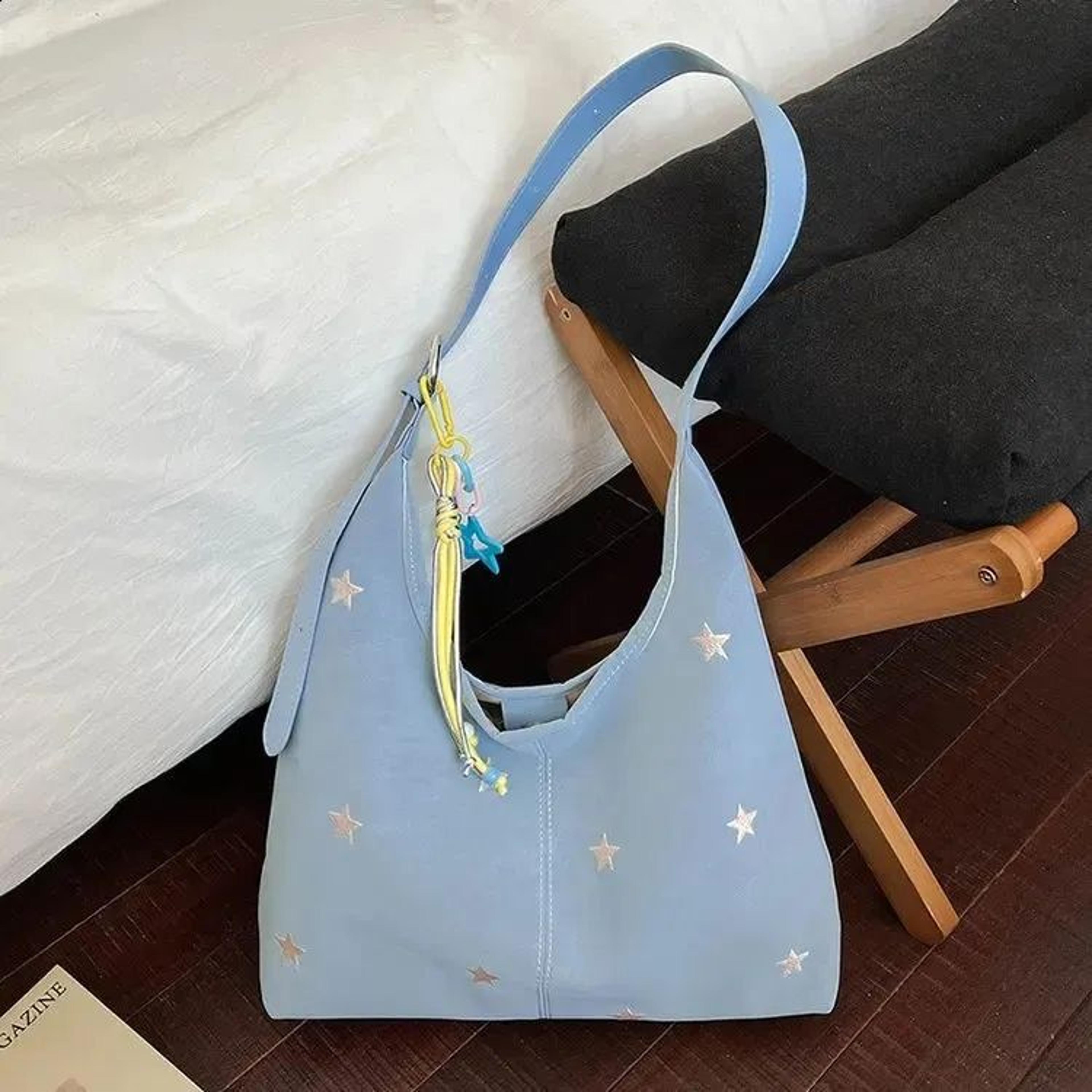 star embroidered hobo shoulder bag for women with star pendant