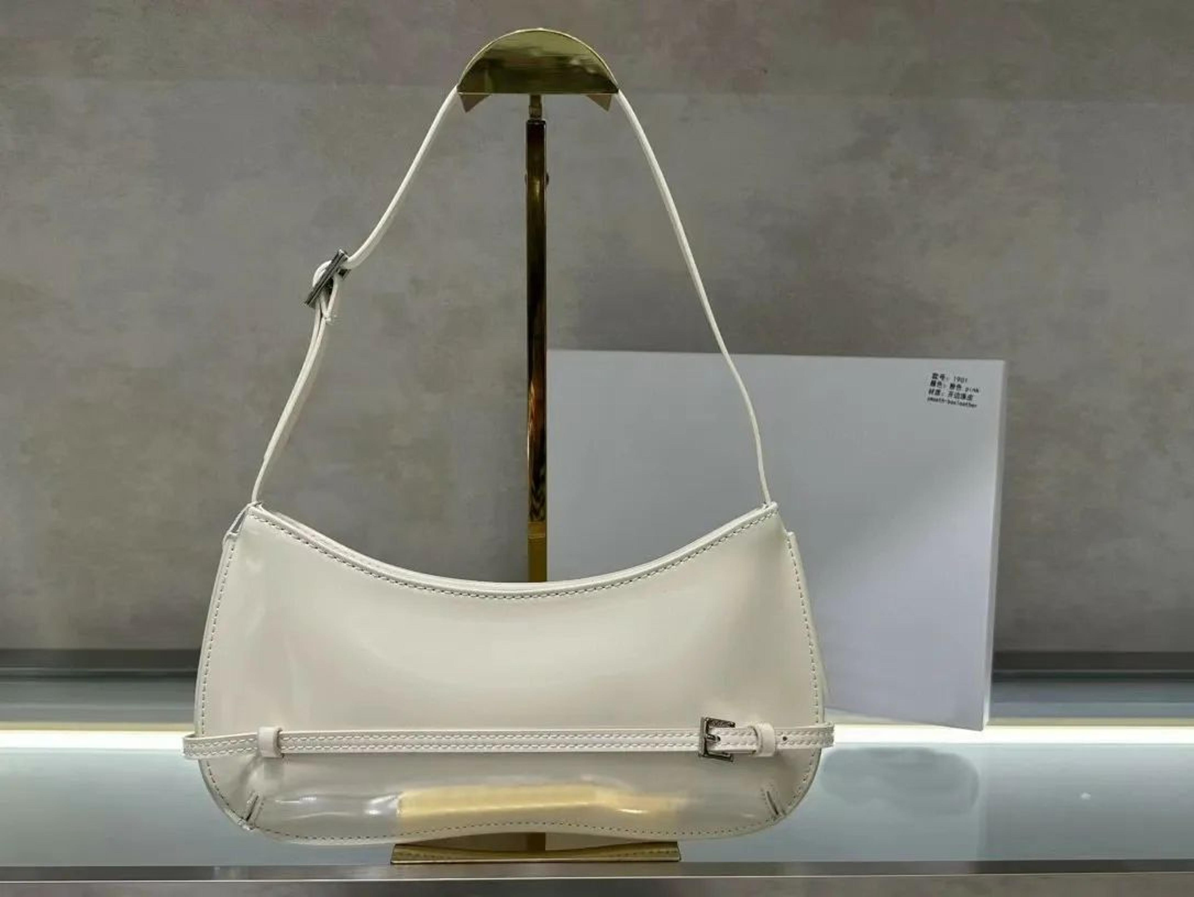 Patent Leather Baguette Shoulder Bag With Adjustable Buckle Strap And Silver Hardware 1