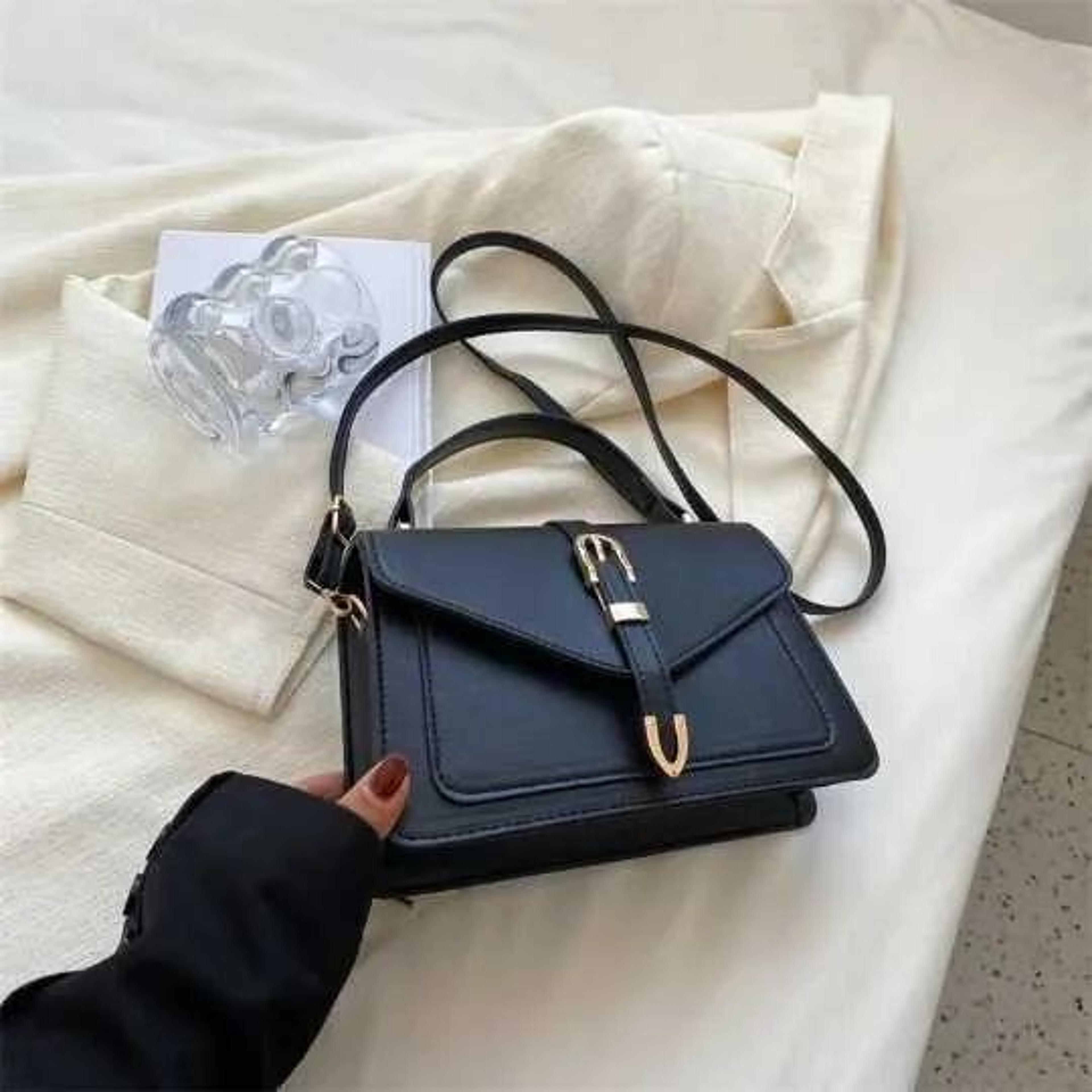 pu leather crossbody shoulder bag with zipper closure and adjustable strap