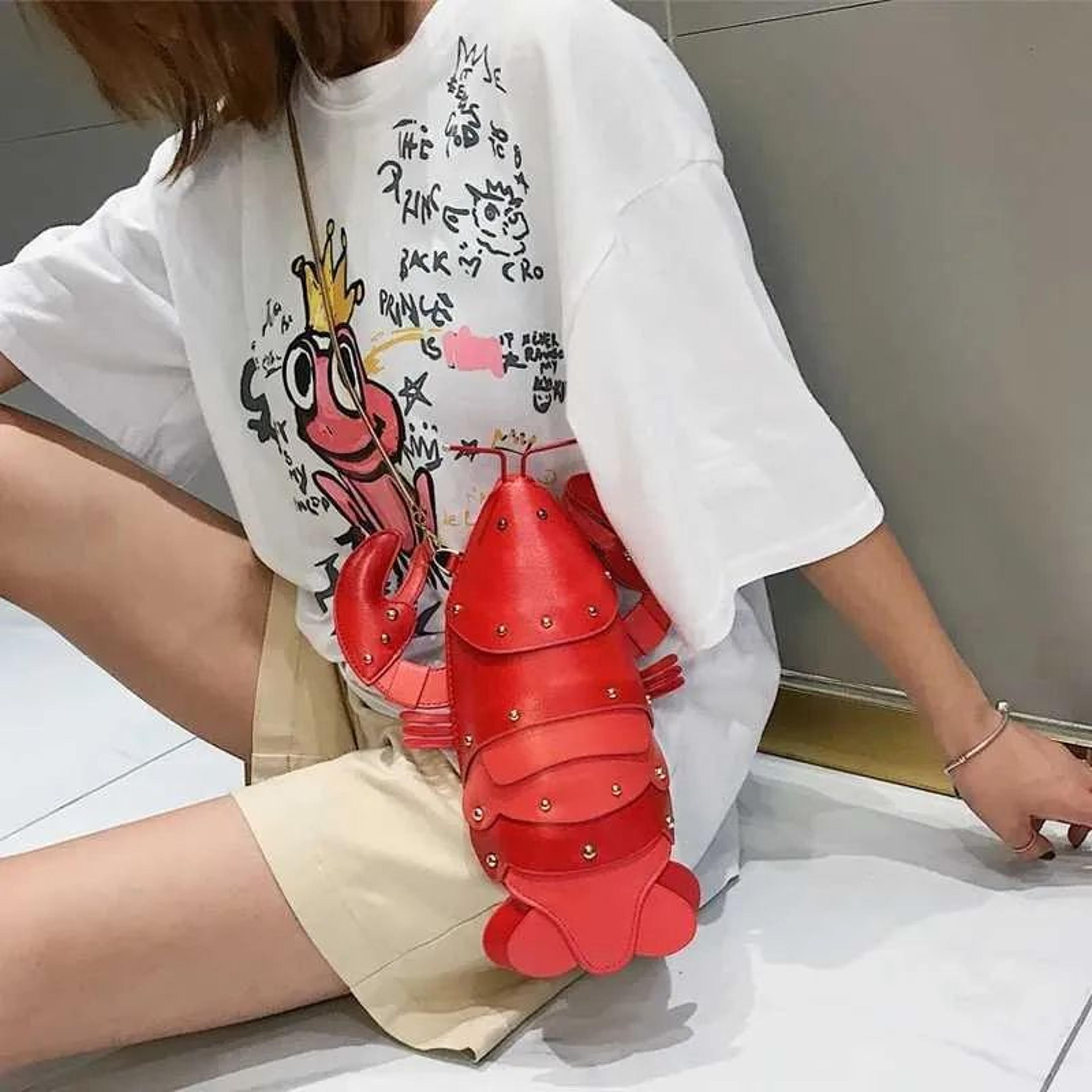 mini pu leather crossbody bag with lobster design and chain strap