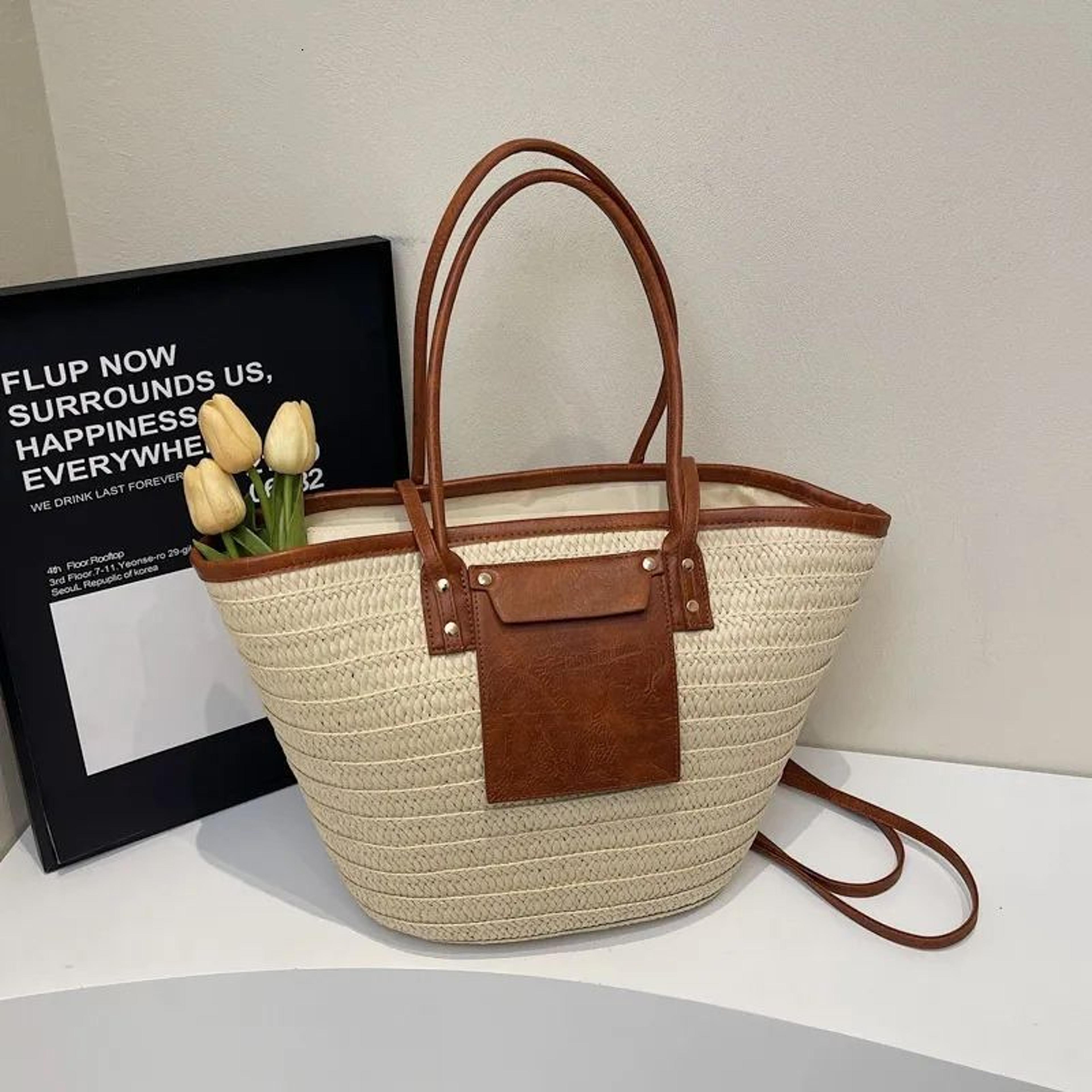 large straw tote bag for women with woven design and leather pocket