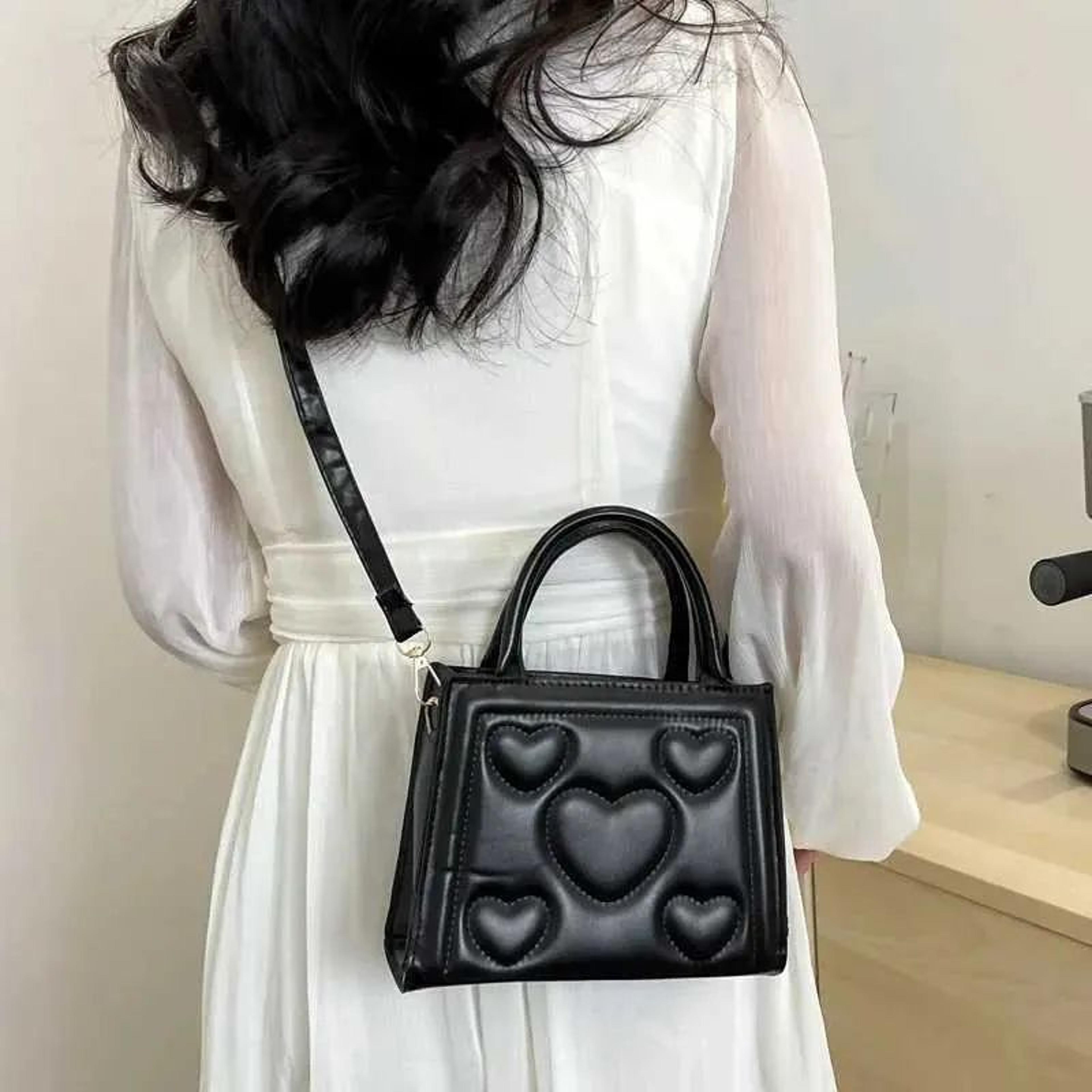 womens crossbody shoulder bag with adjustable strap and zippered compartments