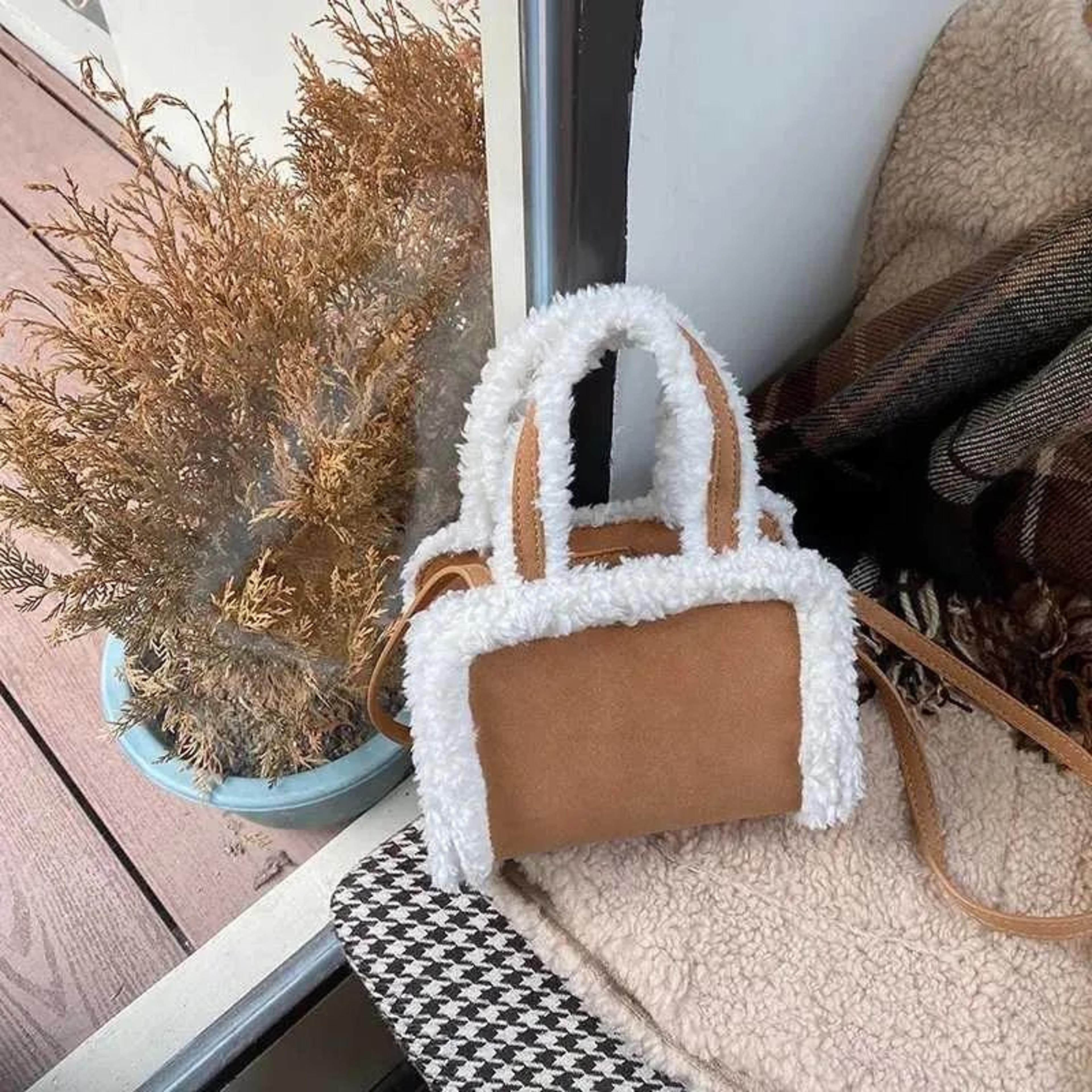 women plush crossbody handbag with wide shoulder strap