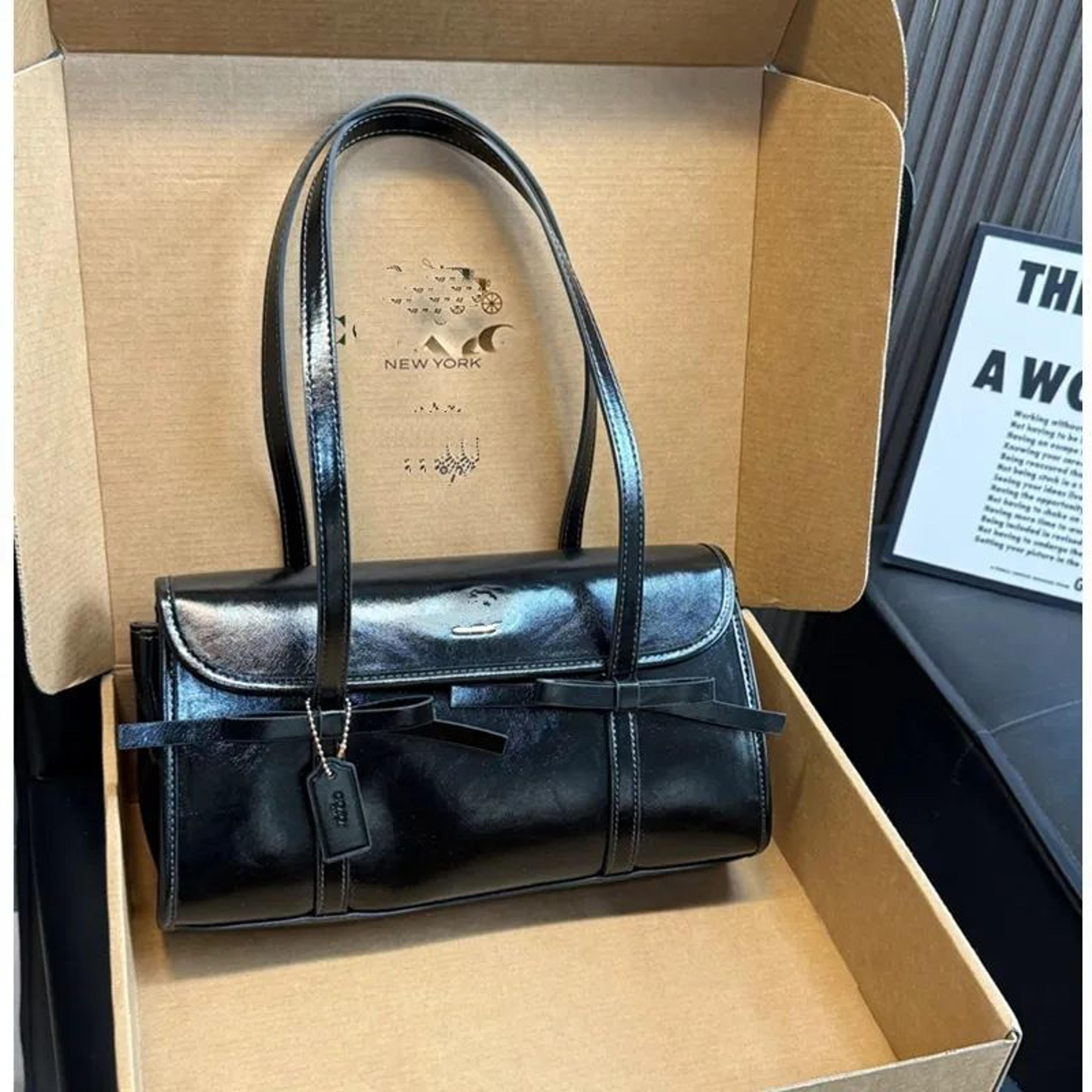 Womens Glossy Leather Baguette Shoulder Bag With Bow Detail And Top Handles 1