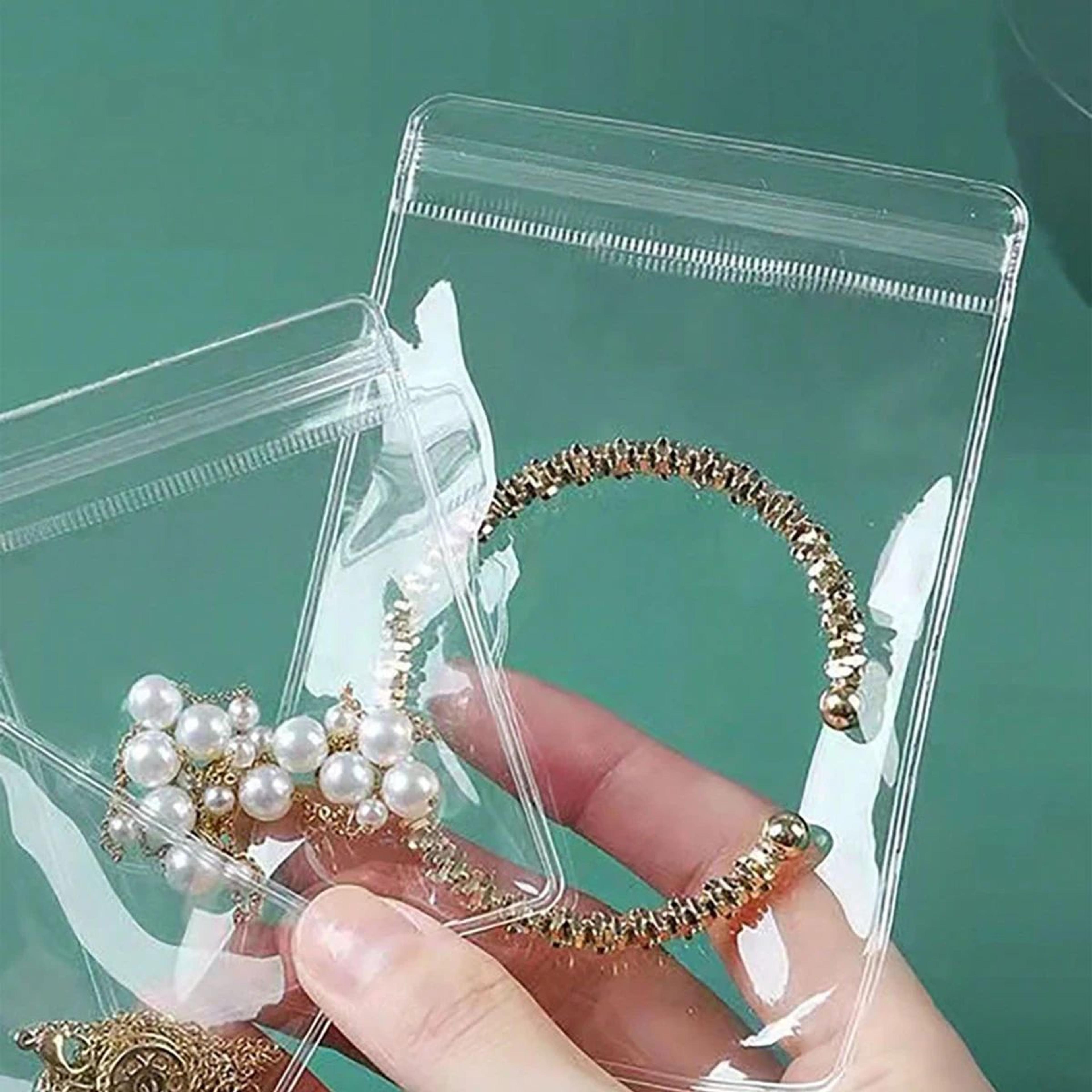 50 piece transparent pvc jewelry storage bags for earrings and necklaces