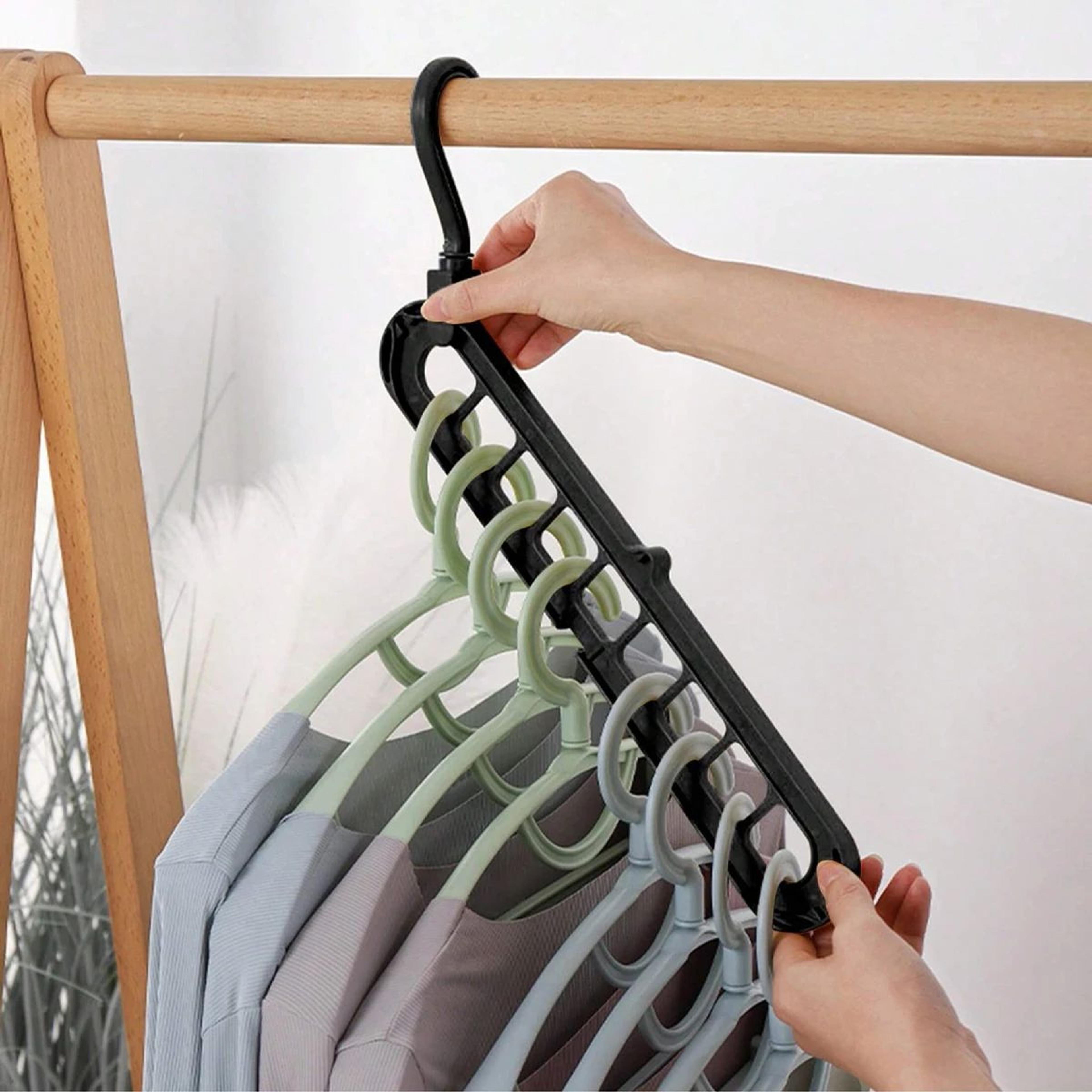 nine hole folding clothes hanger for space saving closet storage