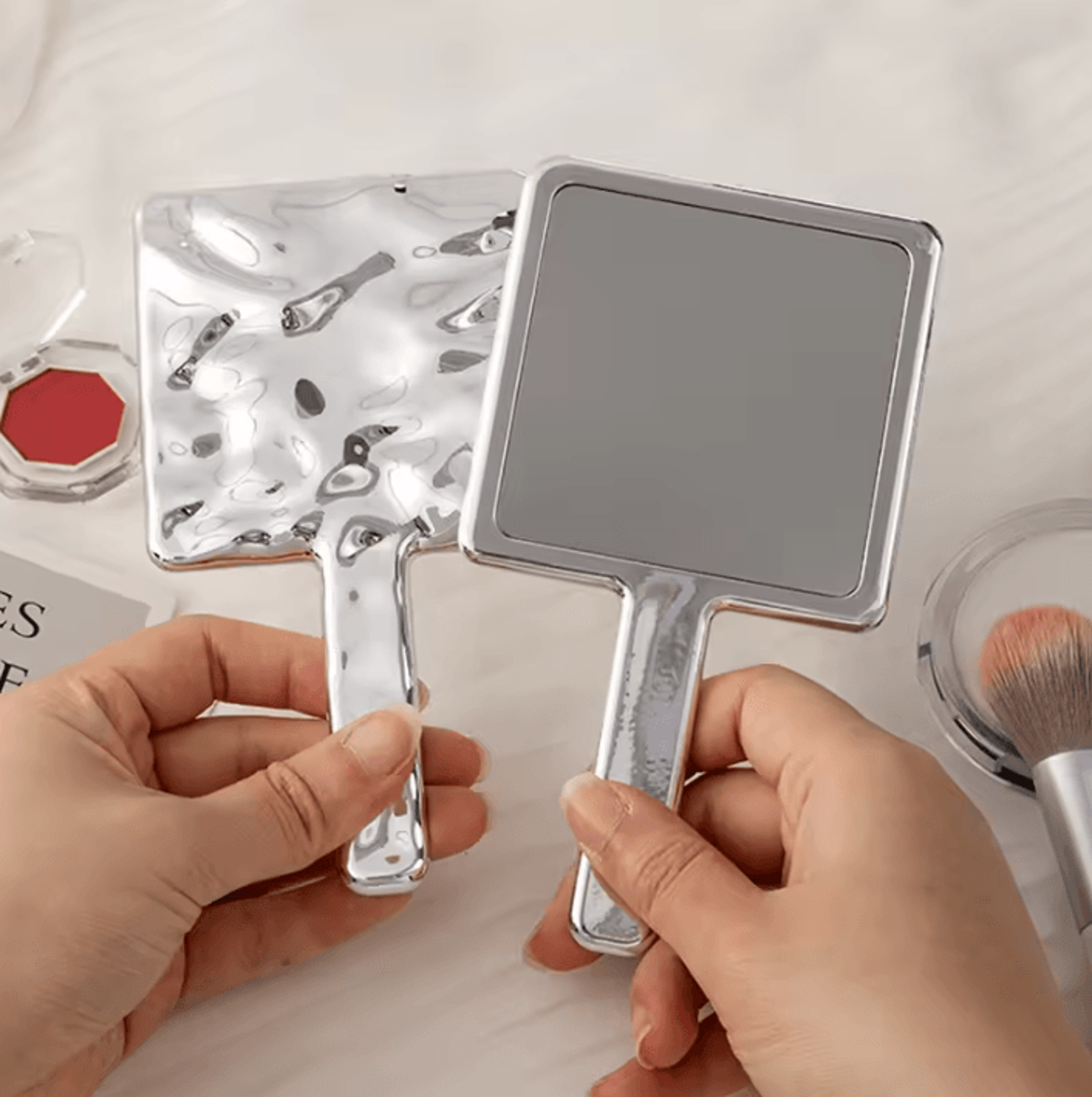 Liquid Shape Handheld Makeup Mirror For Salon And Vanity 1