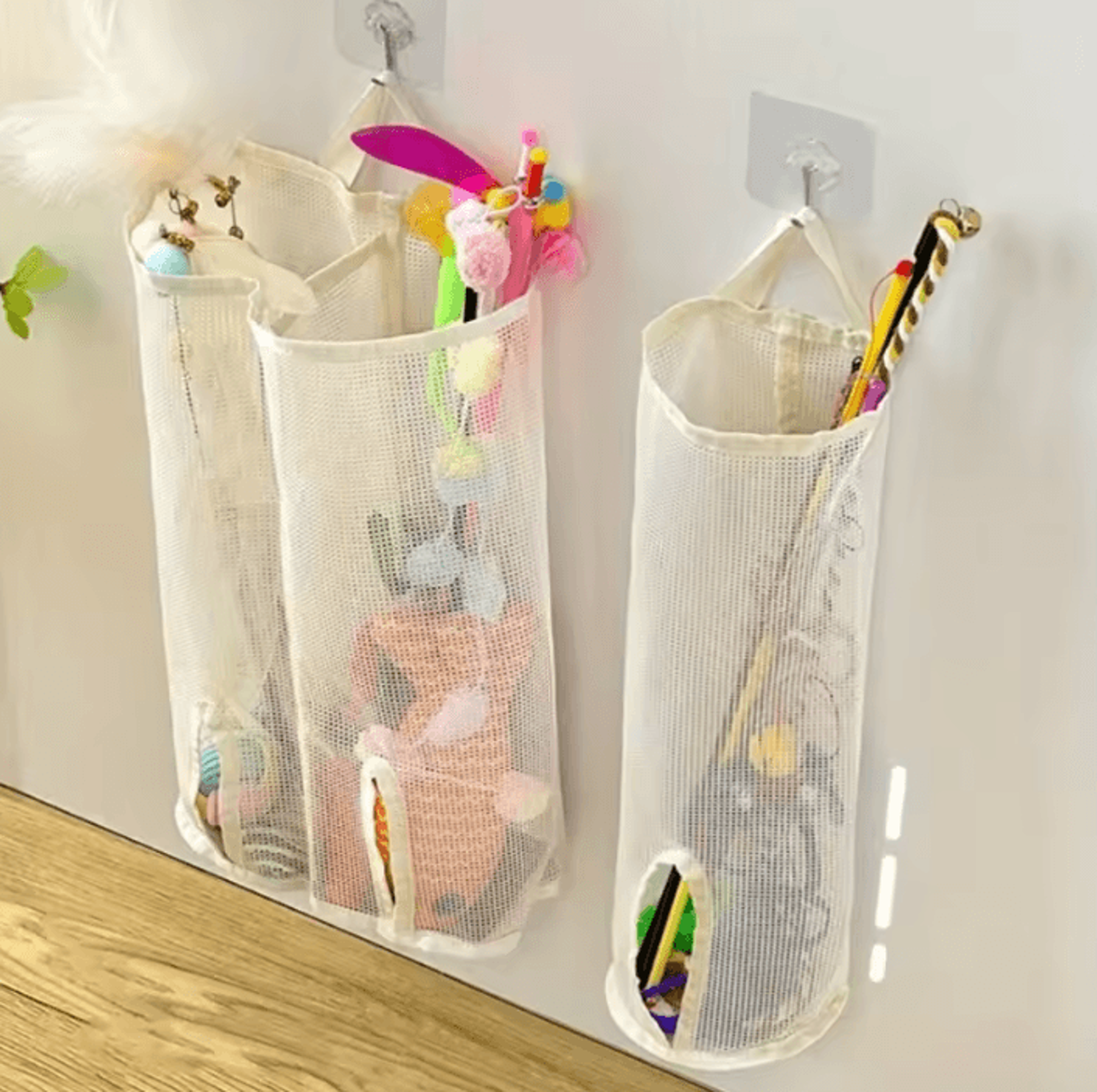 wall-mounted mesh pet toy storage bag and organizer