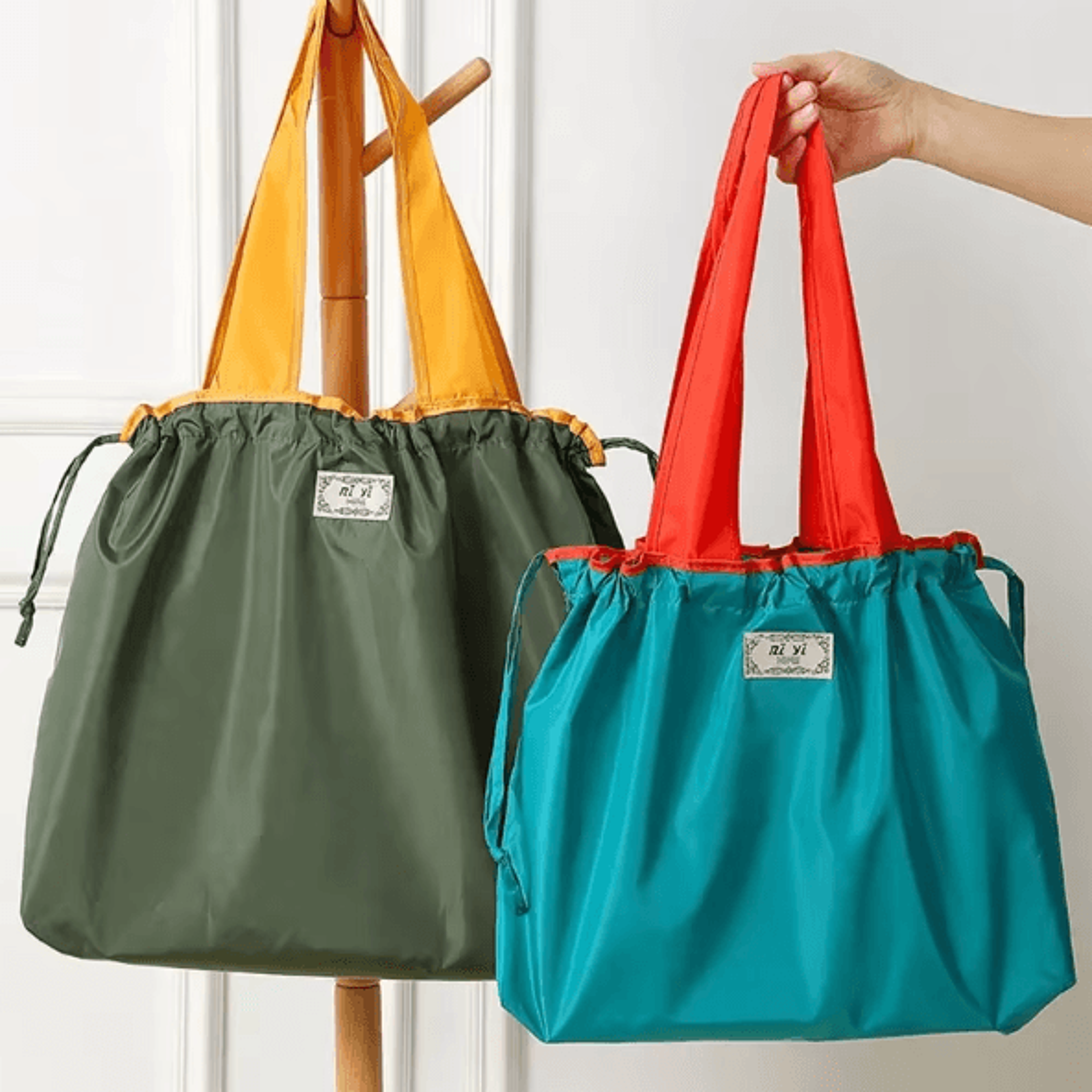 ecocarry foldable reusable grocery shoulder bag with drawstring closure