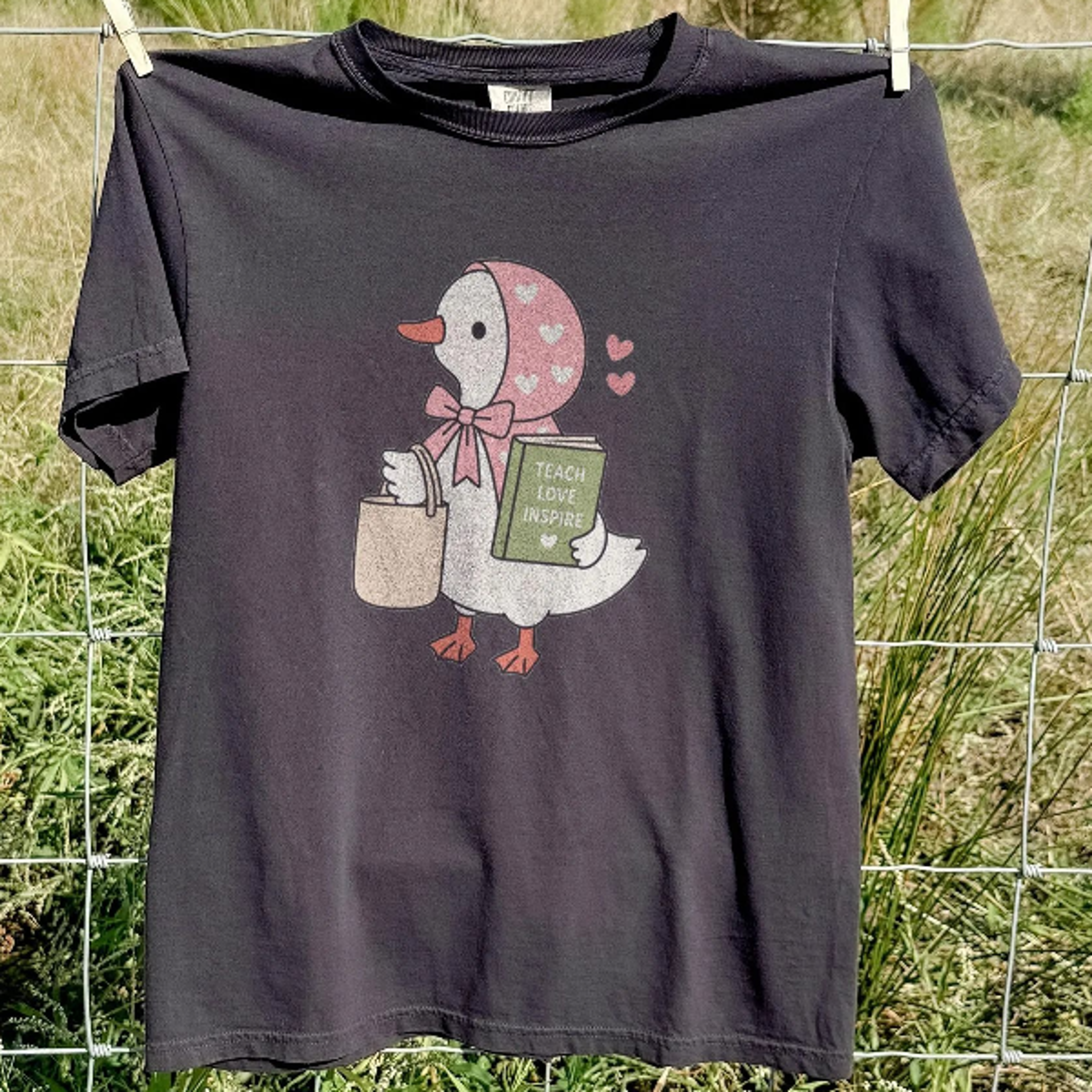 sweet goose reading graphic tee, heart bonnet teacher library inspired shirt, cozy educator