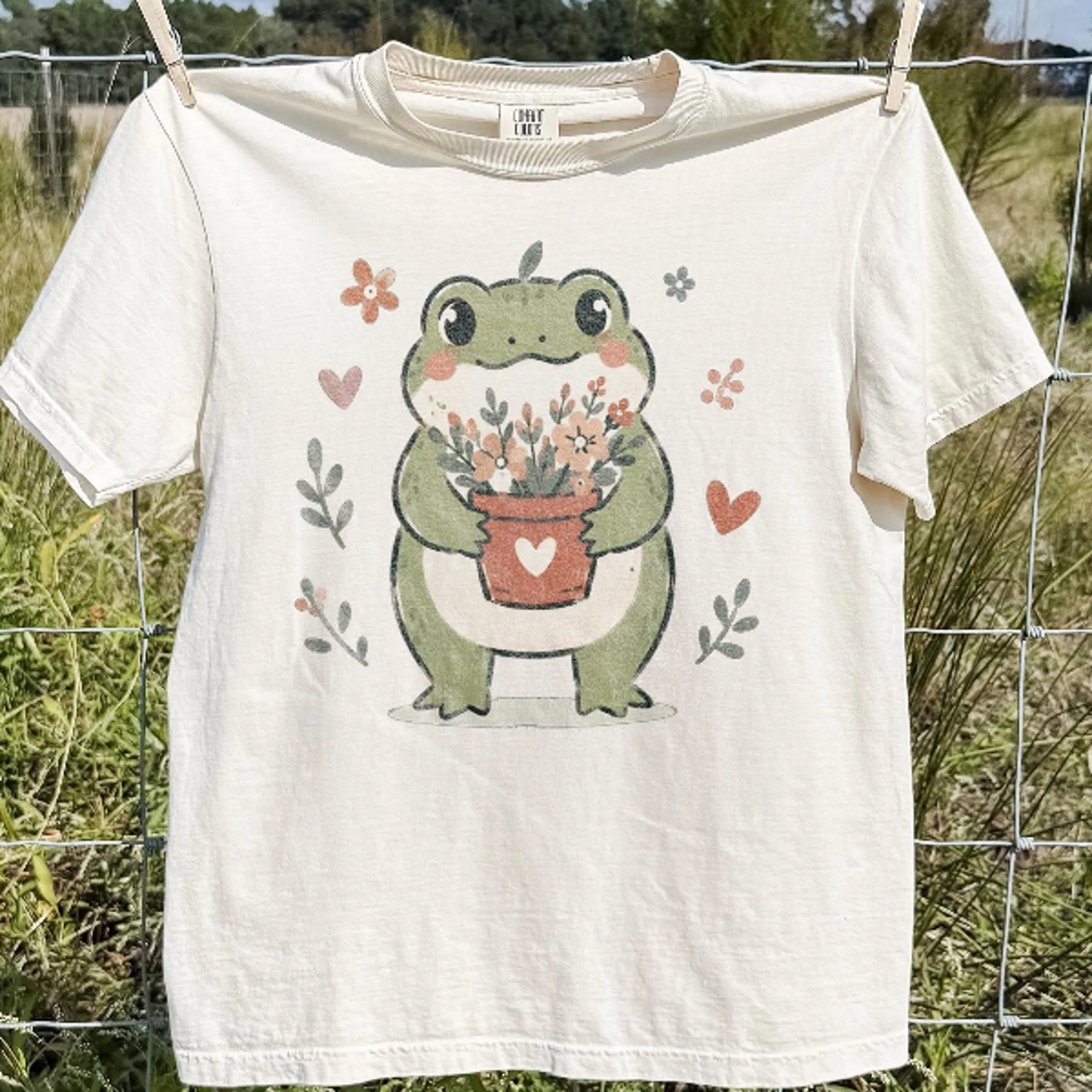 vintage cute frog graphic tee, cottagecore floral animal shirt, whimsical botanical retro style