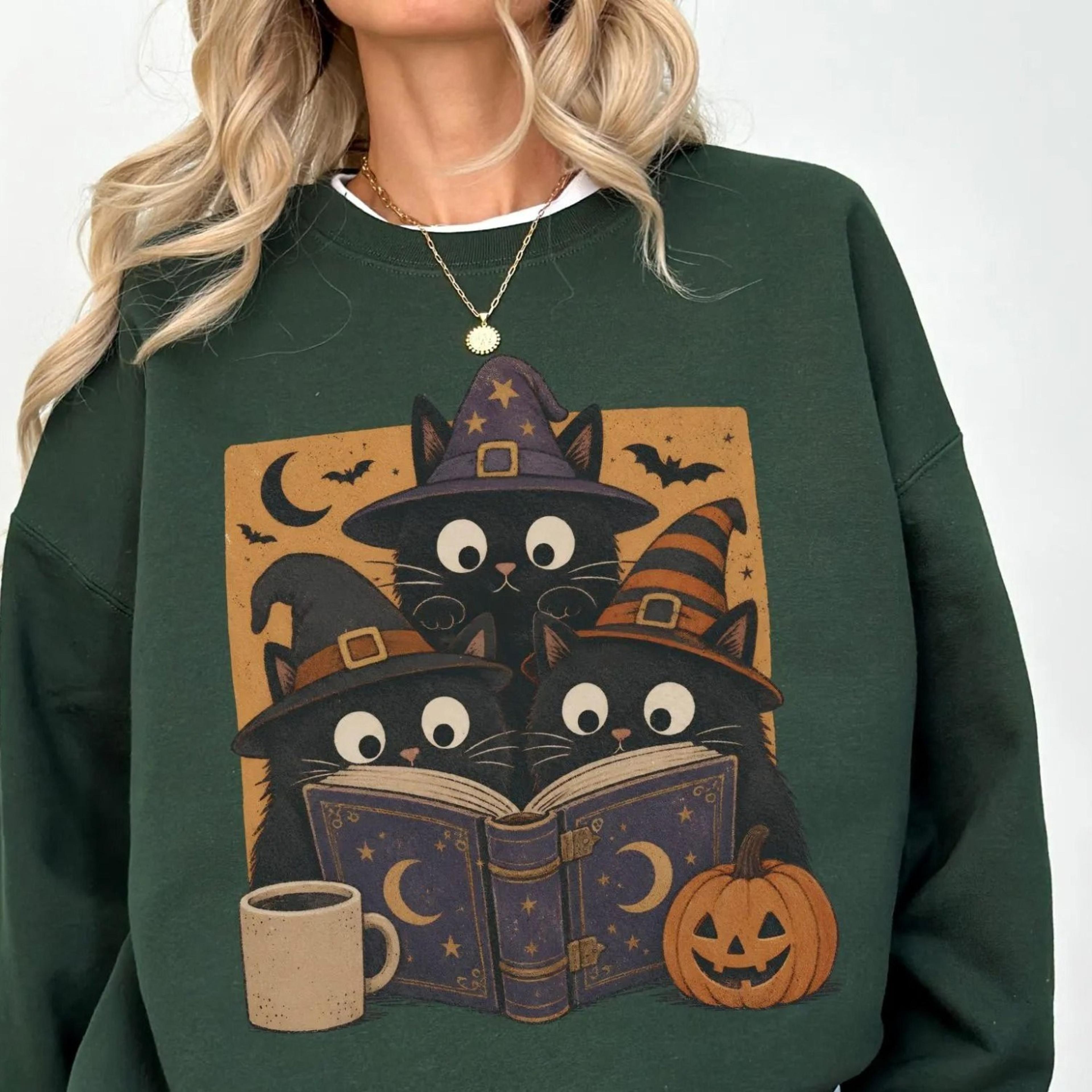 halloween reading cats shirt, cute witchy cat graphic tee, book lover spooky season shirt, cozy pumpkin cat sweatshirt,