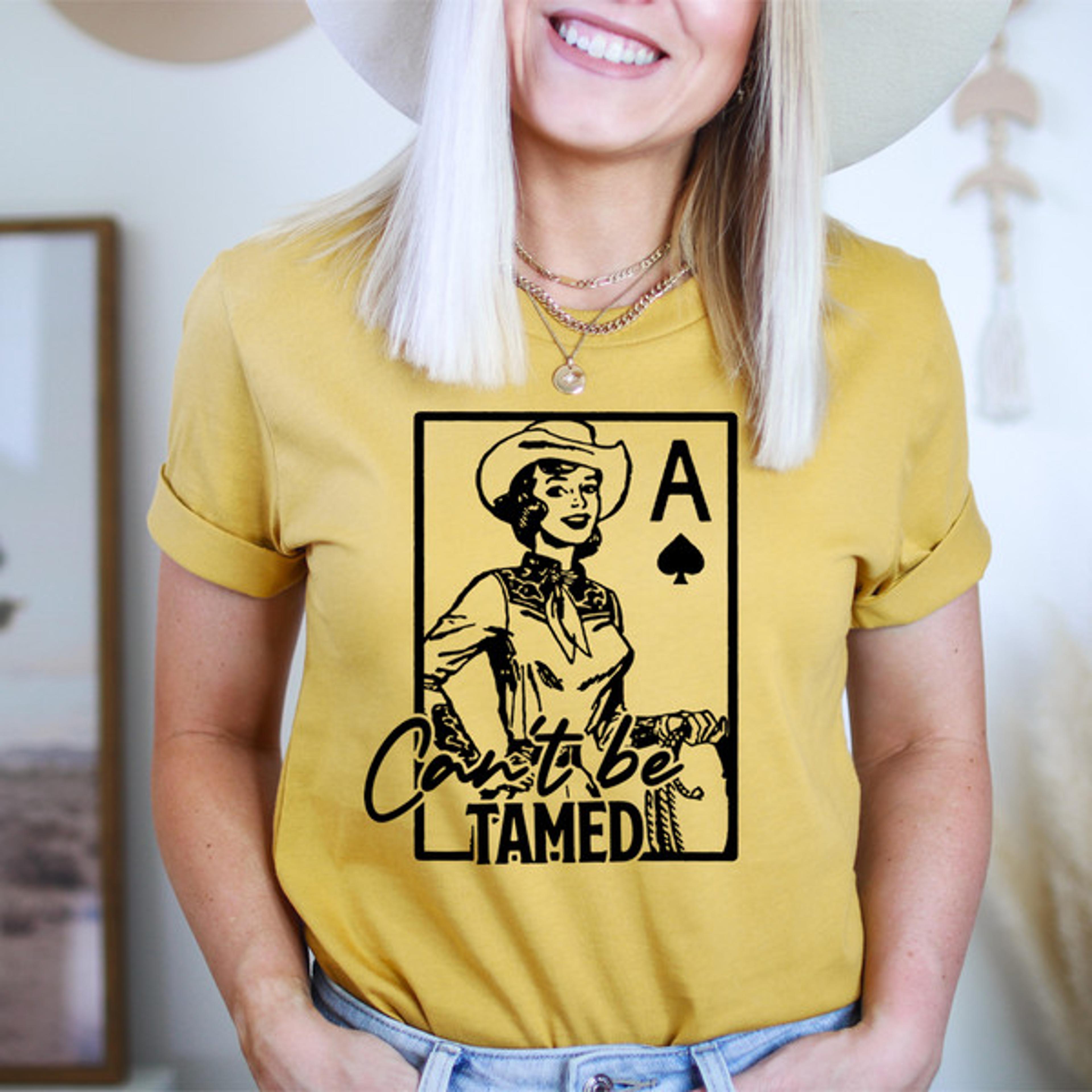 Can't Be Tamed Tee.jpg