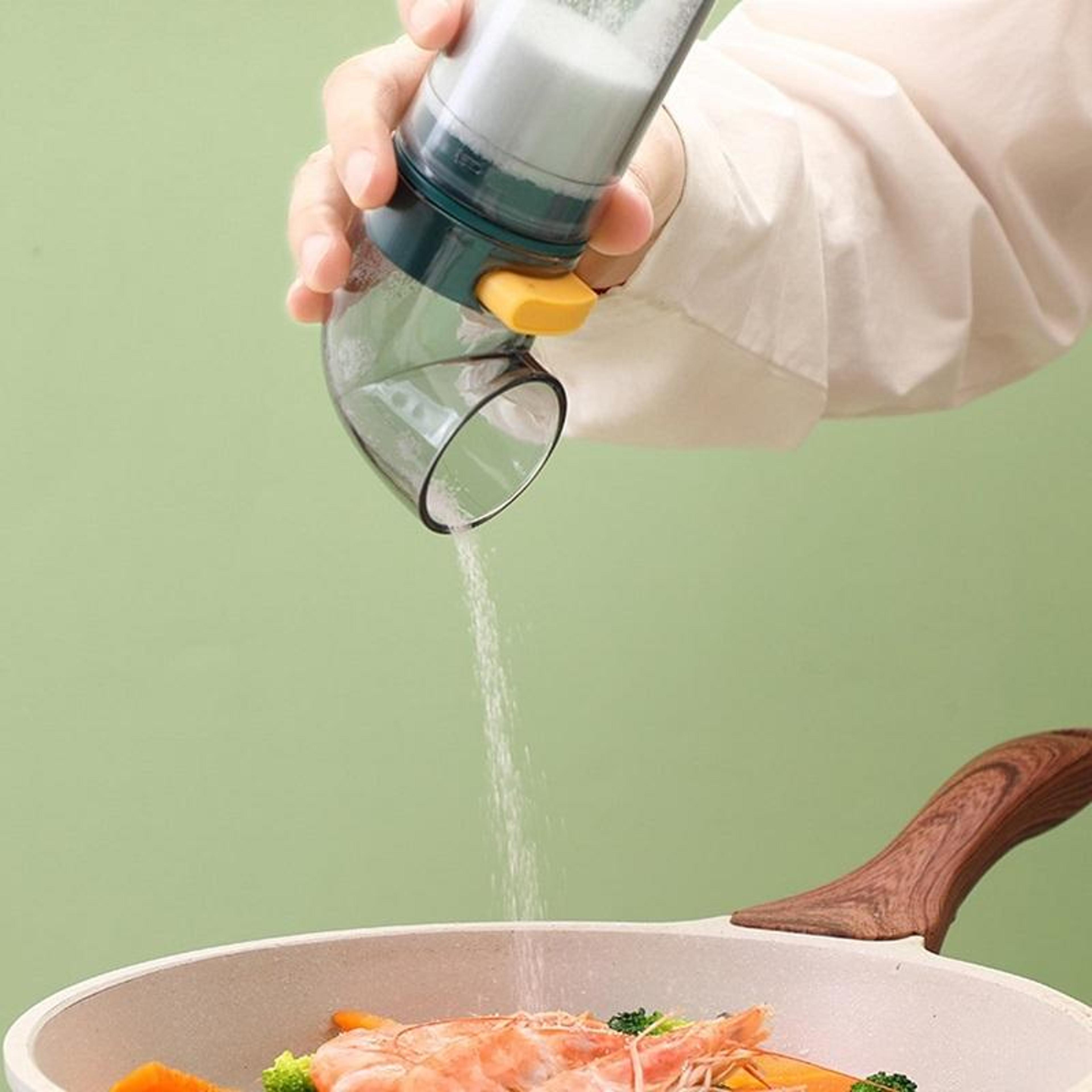 blue press type salt control dispenser bottle for kitchen seasoning