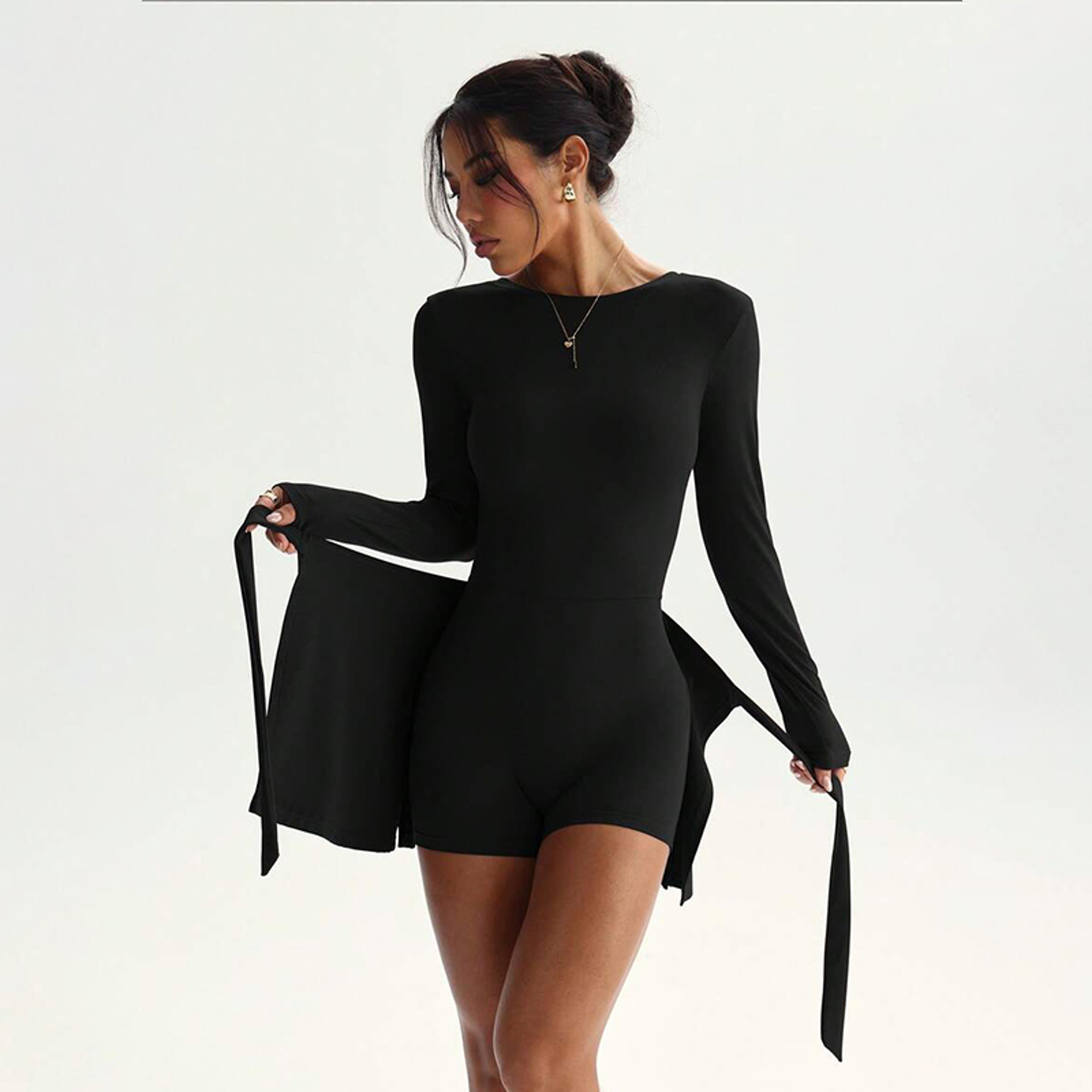 Women's Long Sleeve Yoga Jumpsuit with Wrap Skirt and Lace-Up Detail – view 4