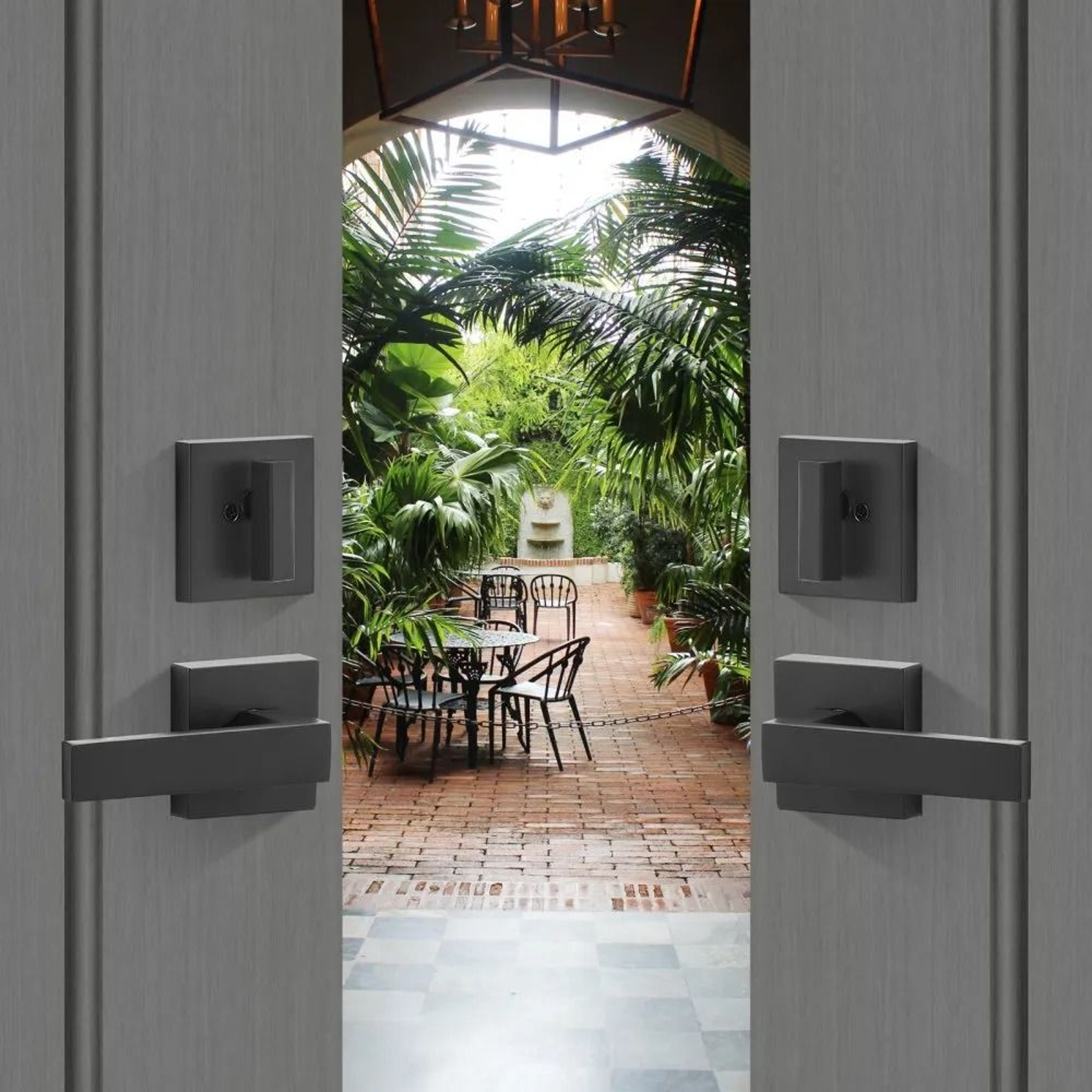 Double Door Handle Set With Matte Black Arched Levers And Reversible Locking Design 6
