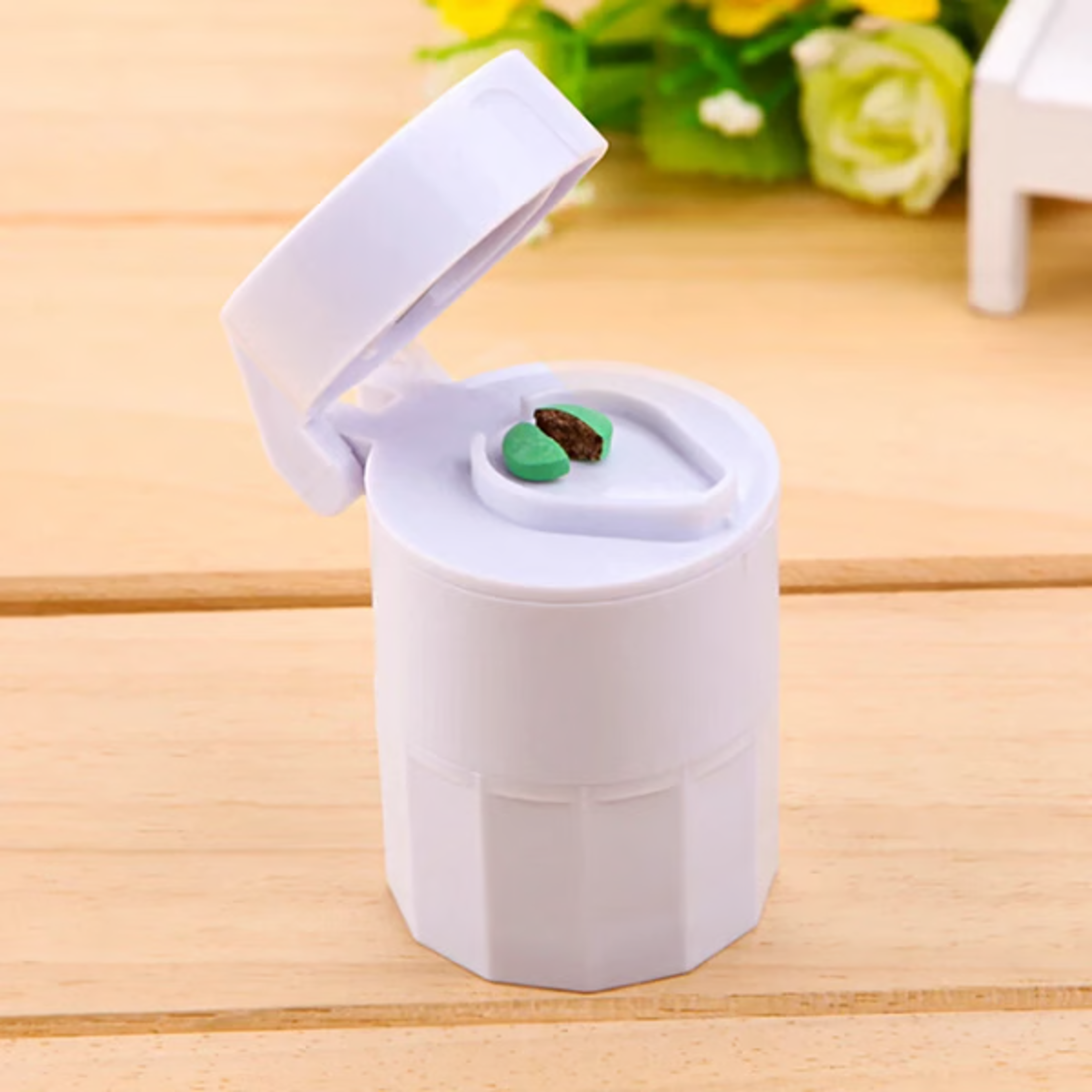 Efficient medication grinder with storage compartment