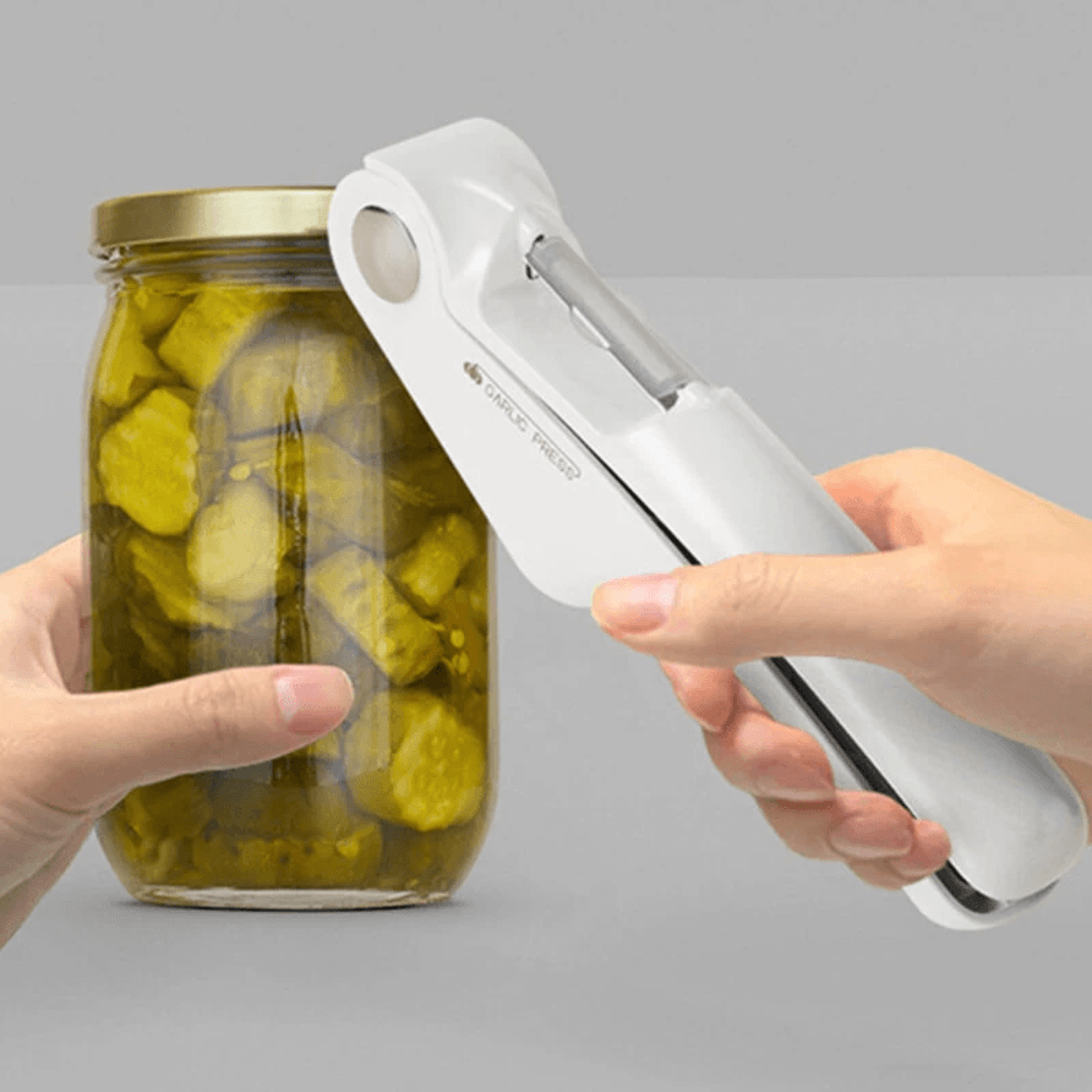 Garlic Press Mincer Slicer And Can Opener 3